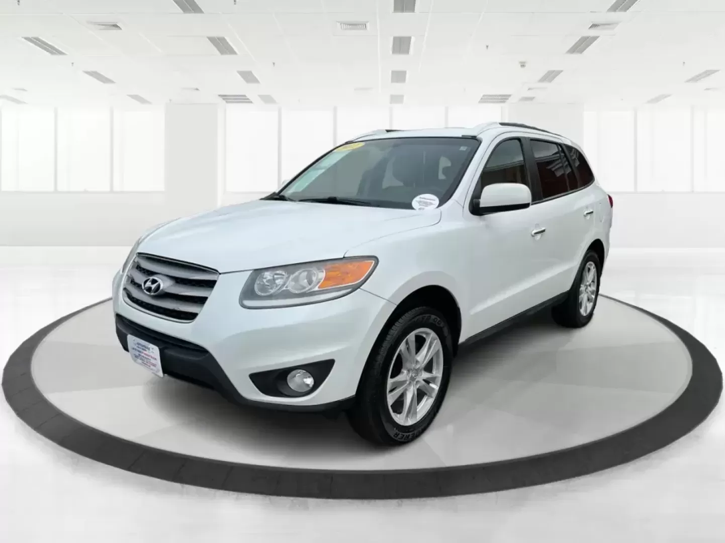 2012 Hyundai Santa Fe Limited V6 (5XYZKDAG5CG) with an 3.5L V-6 DOHC engine, located at 1230 East Main St, Xenia, OH, 45385, (937) 908-9800, 39.688026, -83.910172 - 2012 Hyundai Santa Fe Limited V6 - Photo#7