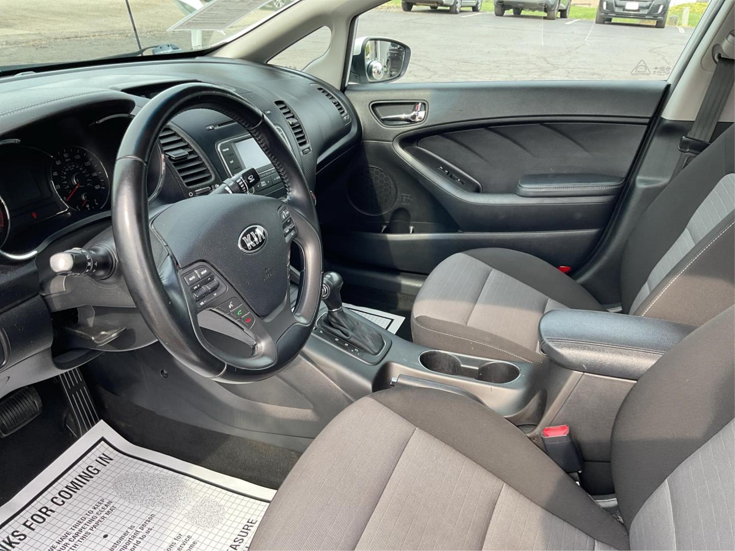 2014 Kia Forte EX (KNAFX4A81E5) with an 2L I-4 gasoline direct injection engine, located at 1099 N County Rd 25A, Troy, OH, 45373, (937) 908-9800, 40.057079, -84.212883 - Photo#9