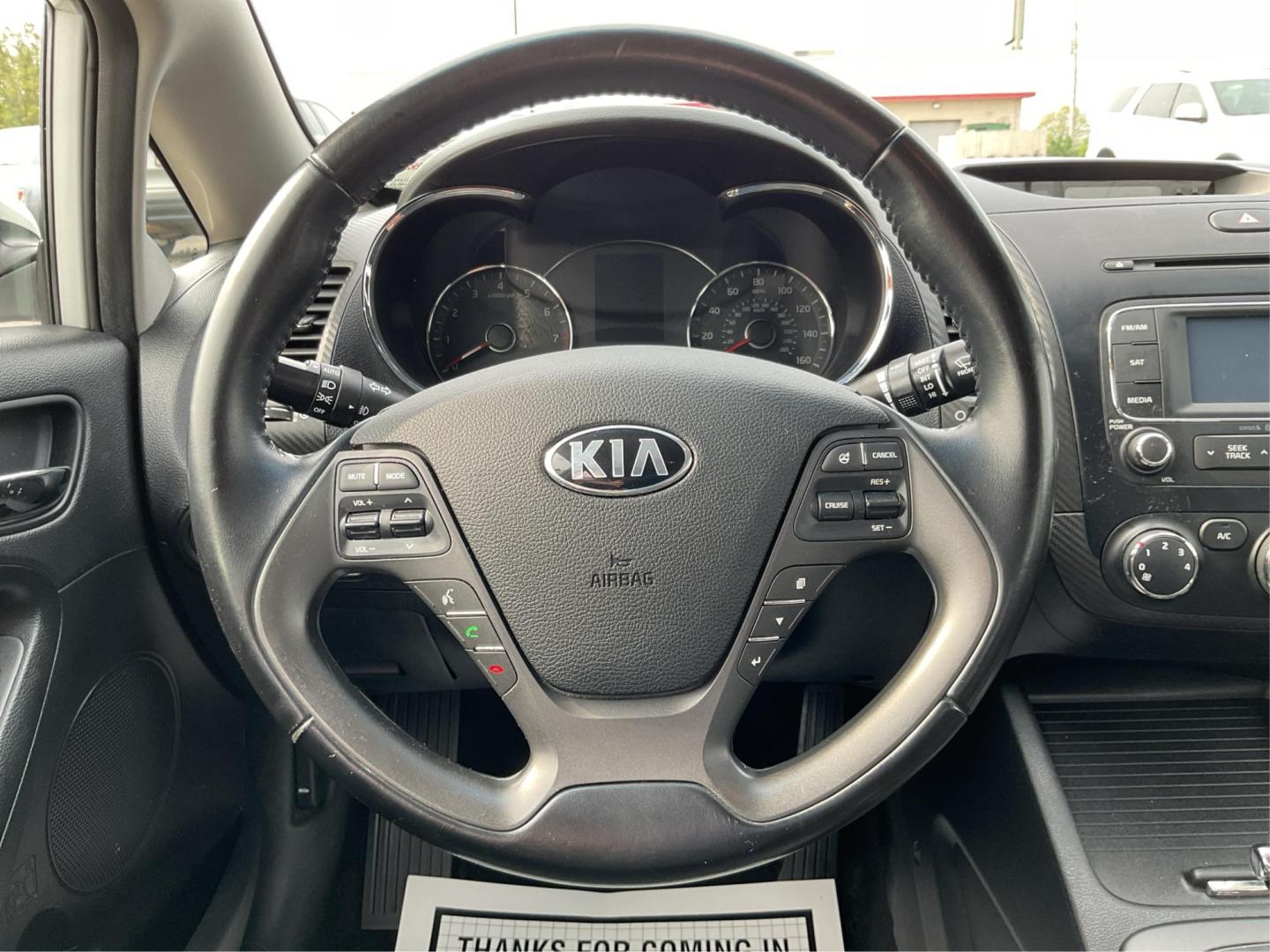 2014 Kia Forte EX (KNAFX4A81E5) with an 2L I-4 gasoline direct injection engine, located at 1099 N County Rd 25A, Troy, OH, 45373, (937) 908-9800, 40.057079, -84.212883 - Photo#16