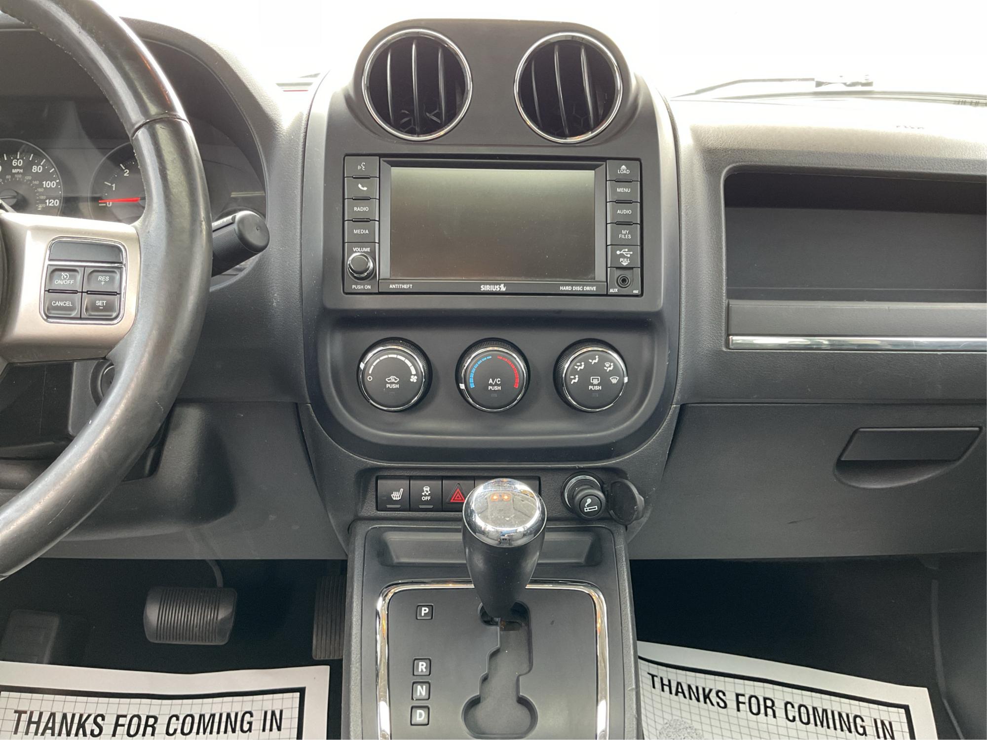 2012 Jeep Patriot Latitude 2WD (1C4NJPFA7CD) with an 2.0L L4 DOHC 16V engine, located at 401 Woodman Dr, Riverside, OH, 45431, (937) 908-9800, 39.760899, -84.123421 - Photo#13