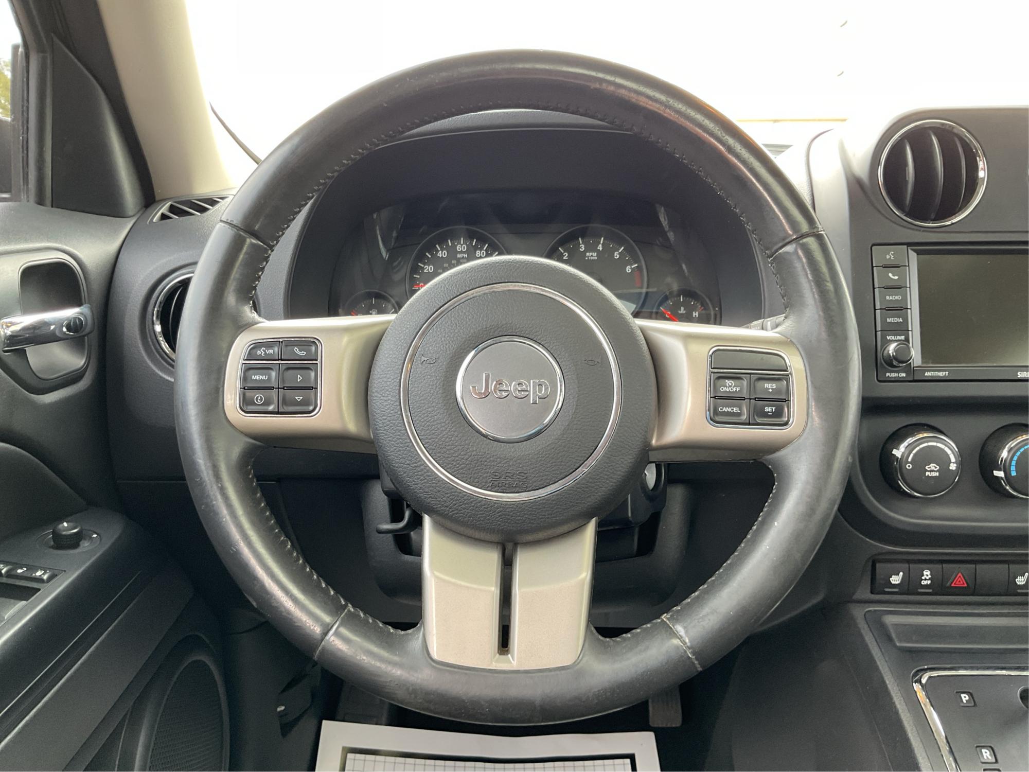 2012 Jeep Patriot Latitude 2WD (1C4NJPFA7CD) with an 2.0L L4 DOHC 16V engine, located at 401 Woodman Dr, Riverside, OH, 45431, (937) 908-9800, 39.760899, -84.123421 - Photo#16