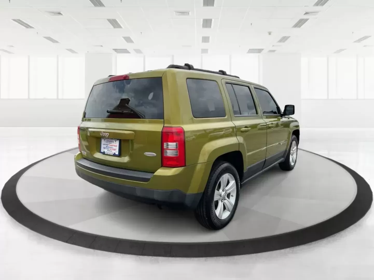 2012 Jeep Patriot Latitude 2WD (1C4NJPFA7CD) with an 2.0L L4 DOHC 16V engine, located at 401 Woodman Dr, Riverside, OH, 45431, (937) 908-9800, 39.760899, -84.123421 - Photo#1