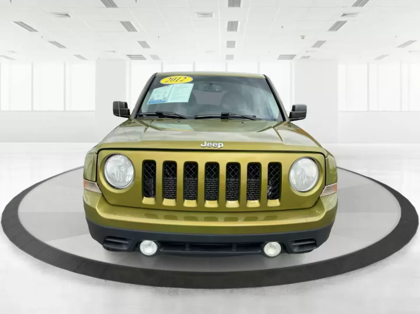 2012 Jeep Patriot Latitude 2WD (1C4NJPFA7CD) with an 2.0L L4 DOHC 16V engine, located at 401 Woodman Dr, Riverside, OH, 45431, (937) 908-9800, 39.760899, -84.123421 - Photo#6