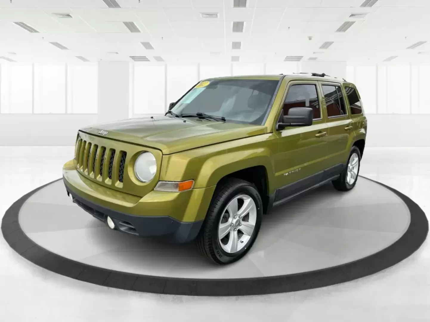 2012 Jeep Patriot Latitude 2WD (1C4NJPFA7CD) with an 2.0L L4 DOHC 16V engine, located at 401 Woodman Dr, Riverside, OH, 45431, (937) 908-9800, 39.760899, -84.123421 - Photo#7