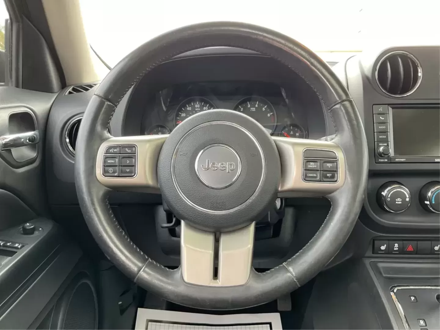 2012 Jeep Patriot Latitude 2WD (1C4NJPFA7CD) with an 2.0L L4 DOHC 16V engine, located at 401 Woodman Dr, Riverside, OH, 45431, (937) 908-9800, 39.760899, -84.123421 - Photo#15