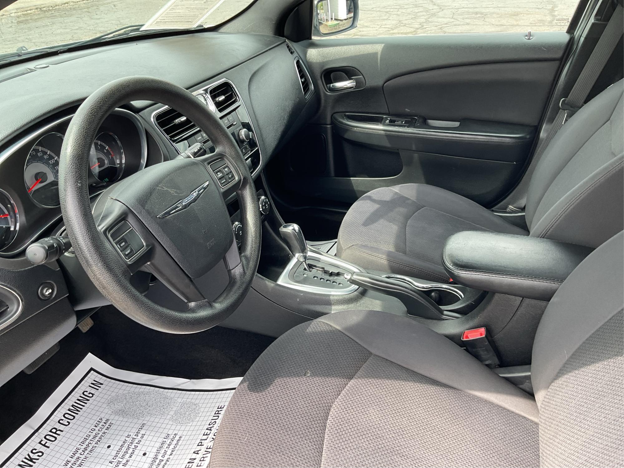 2012 Chrysler 200 LX (1C3CCBAB7CN) with an 2.4L L4 DOHC 16V engine, 6-Speed Automatic transmission, located at 1099 N County Rd 25A , Troy, OH, 45373, (937) 908-9800, 40.057079, -84.212883 - Photo#9