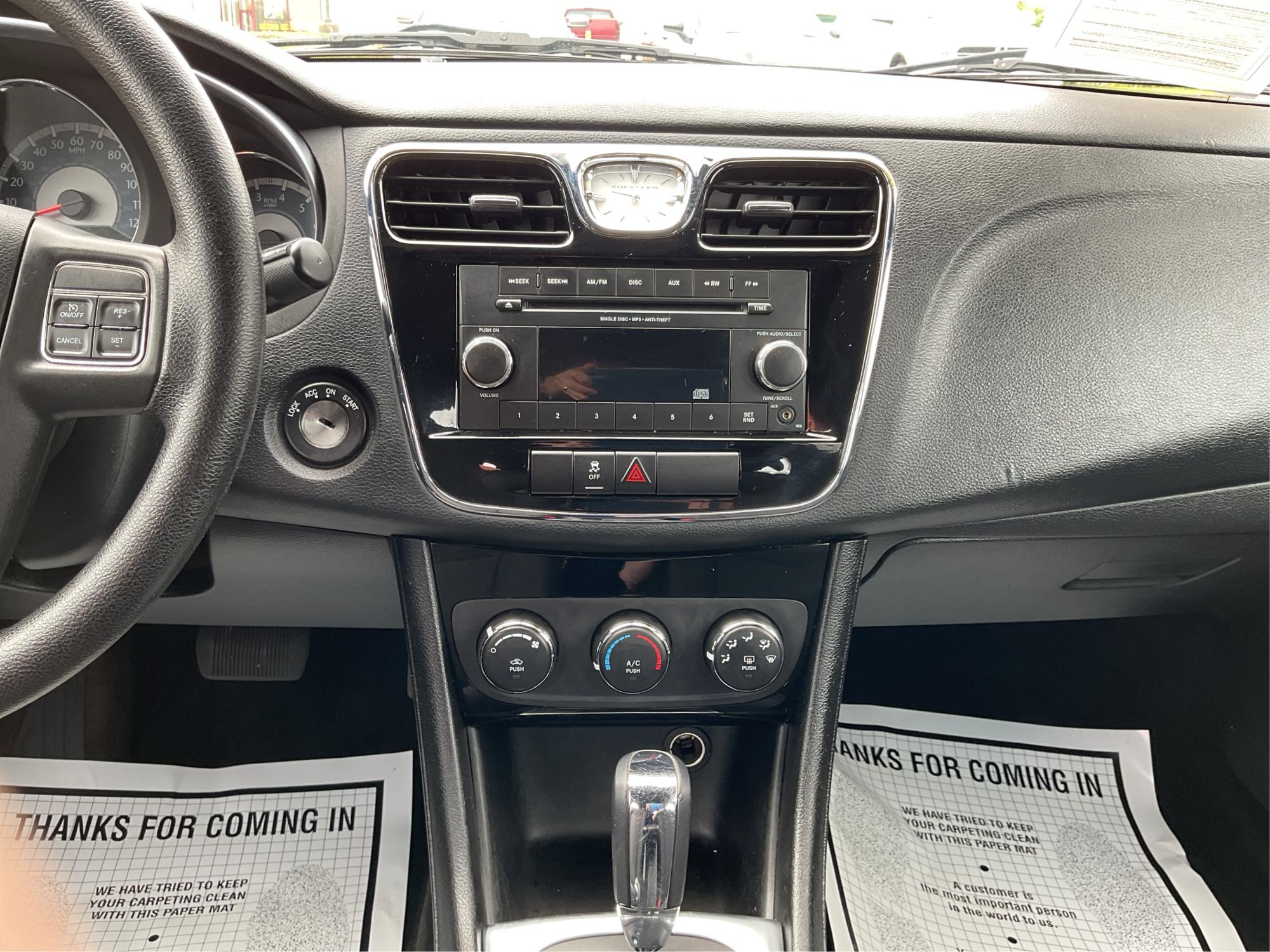2012 Chrysler 200 LX (1C3CCBAB7CN) with an 2.4L L4 DOHC 16V engine, 6-Speed Automatic transmission, located at 1099 N County Rd 25A , Troy, OH, 45373, (937) 908-9800, 40.057079, -84.212883 - Photo#13