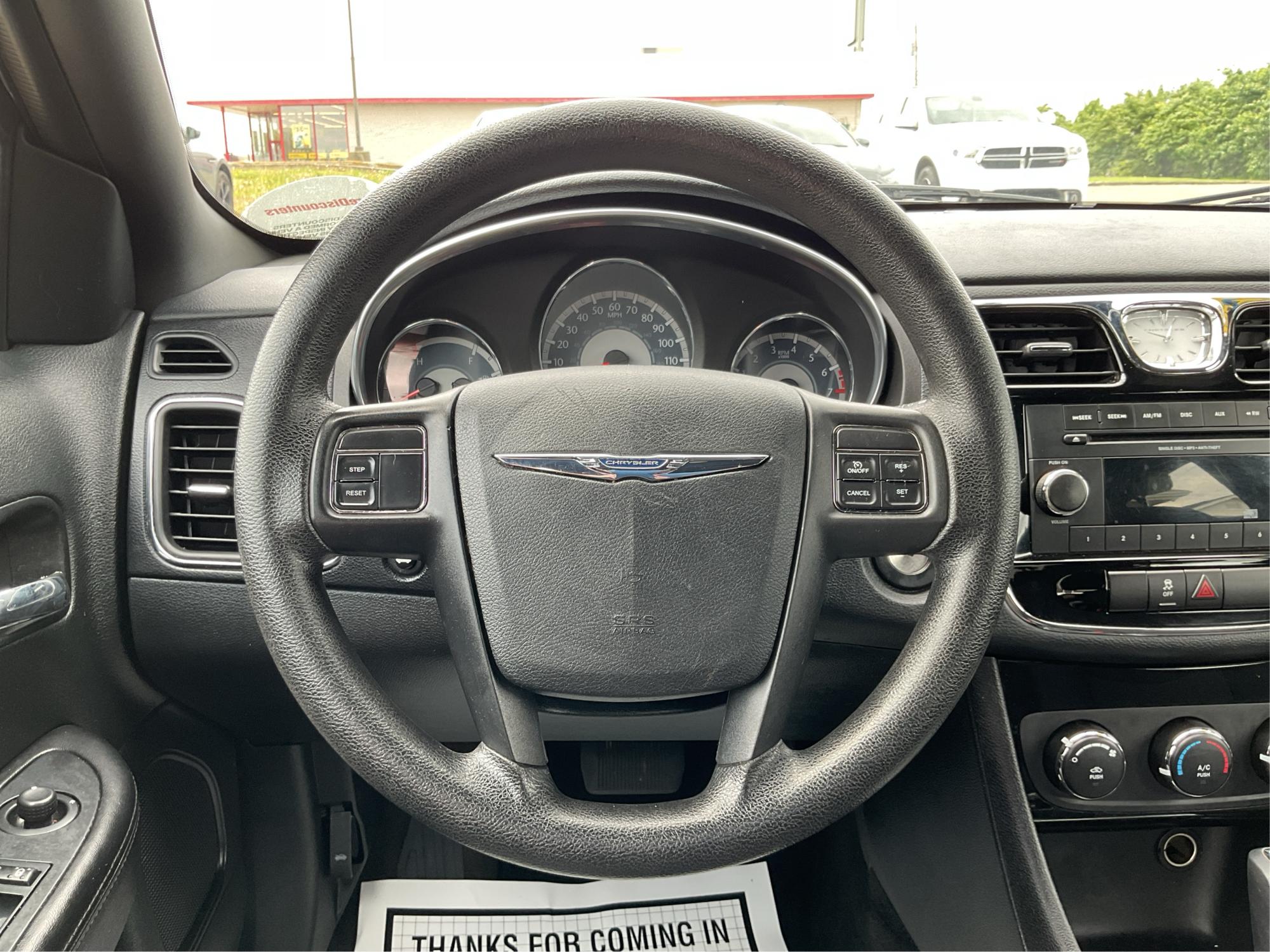 2012 Chrysler 200 LX (1C3CCBAB7CN) with an 2.4L L4 DOHC 16V engine, 6-Speed Automatic transmission, located at 1099 N County Rd 25A , Troy, OH, 45373, (937) 908-9800, 40.057079, -84.212883 - Photo#16