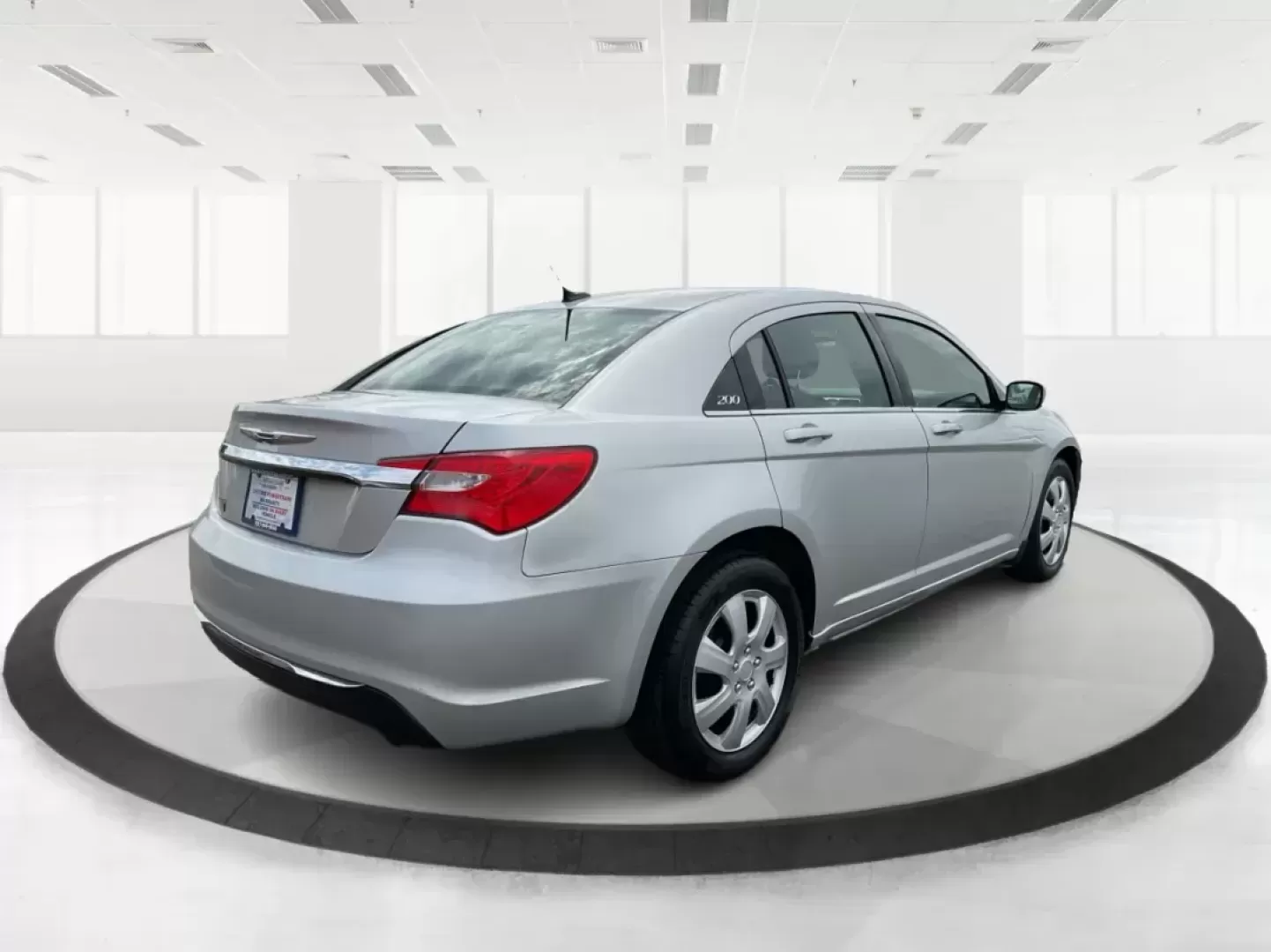 2012 Chrysler 200 LX (1C3CCBAB7CN) with an 2.4L L4 DOHC 16V engine, 6-Speed Automatic transmission, located at 1099 N County Rd 25A, Troy, OH, 45373, (937) 908-9800, 40.057079, -84.212883 - 2012 Chrysler 200 LX - Photo#2