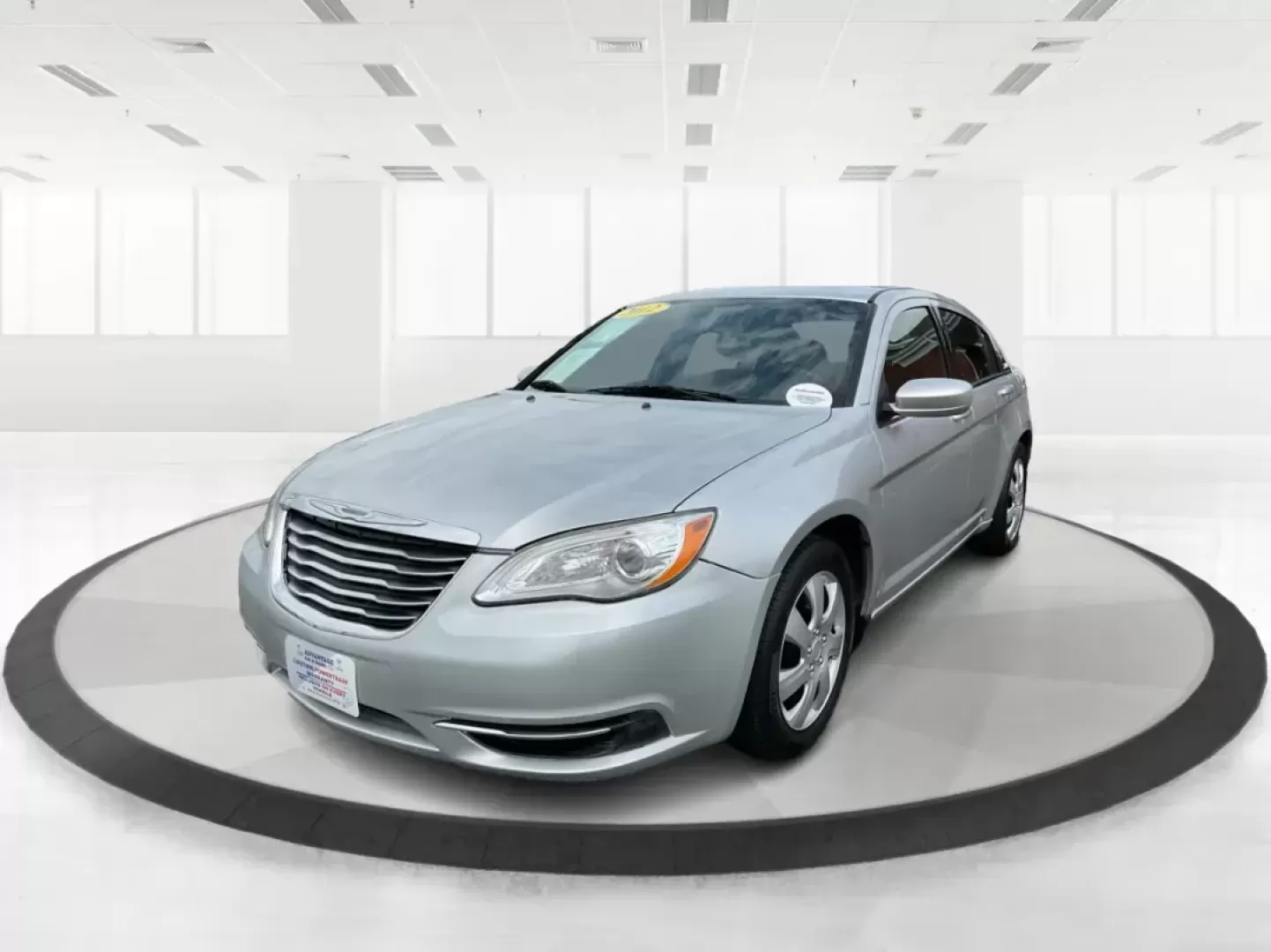 2012 Chrysler 200 LX (1C3CCBAB7CN) with an 2.4L L4 DOHC 16V engine, 6-Speed Automatic transmission, located at 1099 N County Rd 25A, Troy, OH, 45373, (937) 908-9800, 40.057079, -84.212883 - 2012 Chrysler 200 LX - Photo#7
