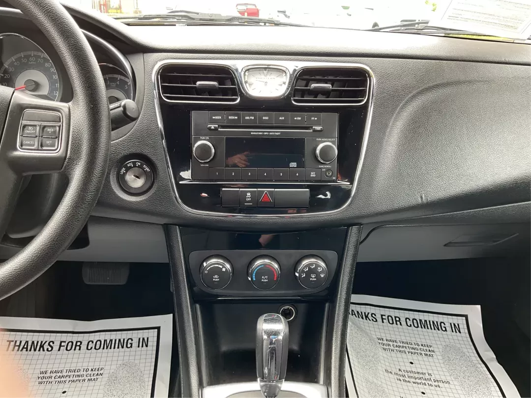 2012 Chrysler 200 LX (1C3CCBAB7CN) with an 2.4L L4 DOHC 16V engine, 6-Speed Automatic transmission, located at 1099 N County Rd 25A , Troy, OH, 45373, (937) 908-9800, 40.057079, -84.212883 - 2012 Chrysler 200 LX - Photo#12