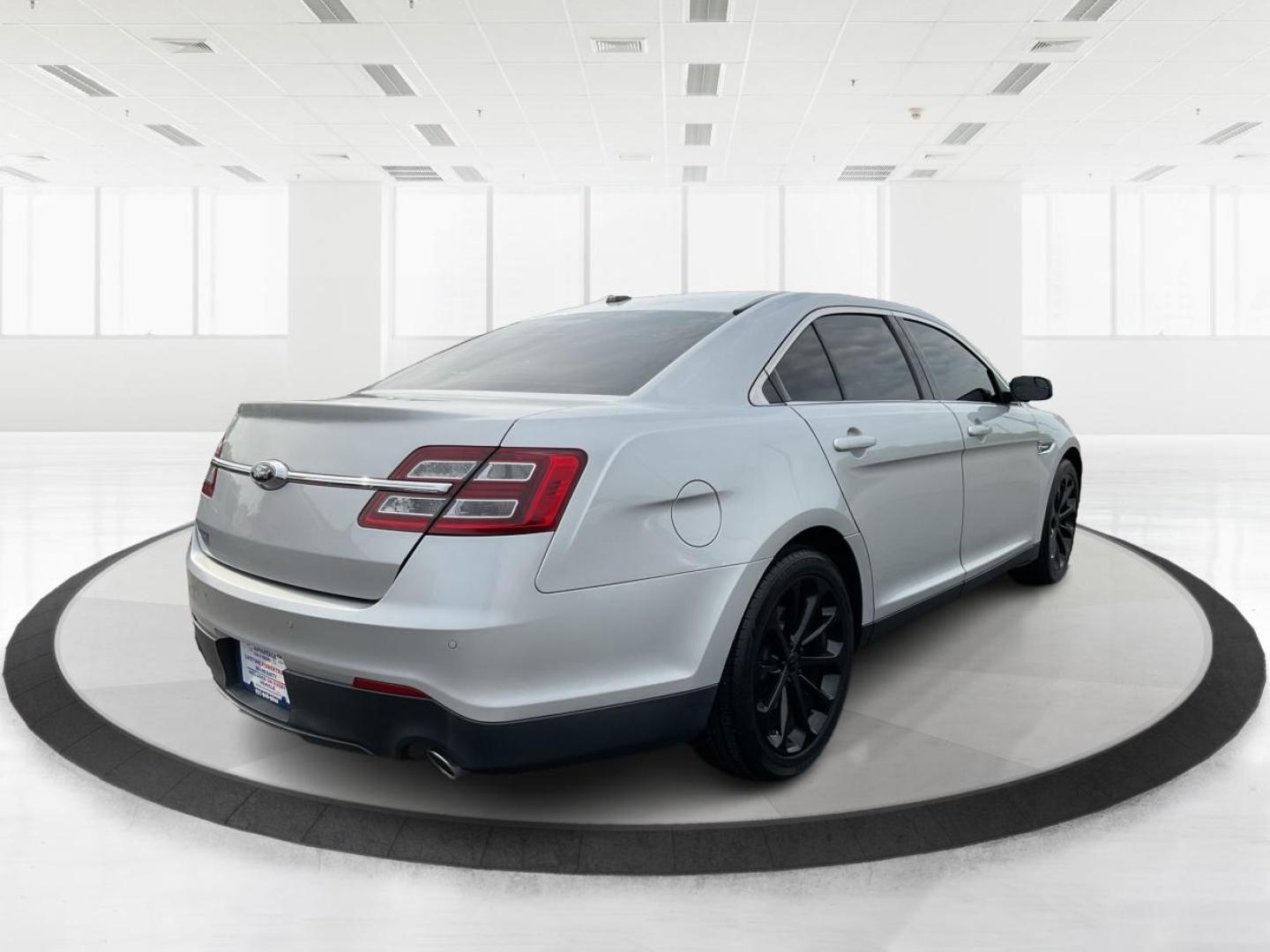 2014 Ford Taurus SEL (1FAHP2E86EG) with an EcoBoost 2L I-4 gasoline direct injection engine, located at 1099 N County Rd 25A, Troy, OH, 45373, (937) 908-9800, 40.057079, -84.212883 - Photo#2