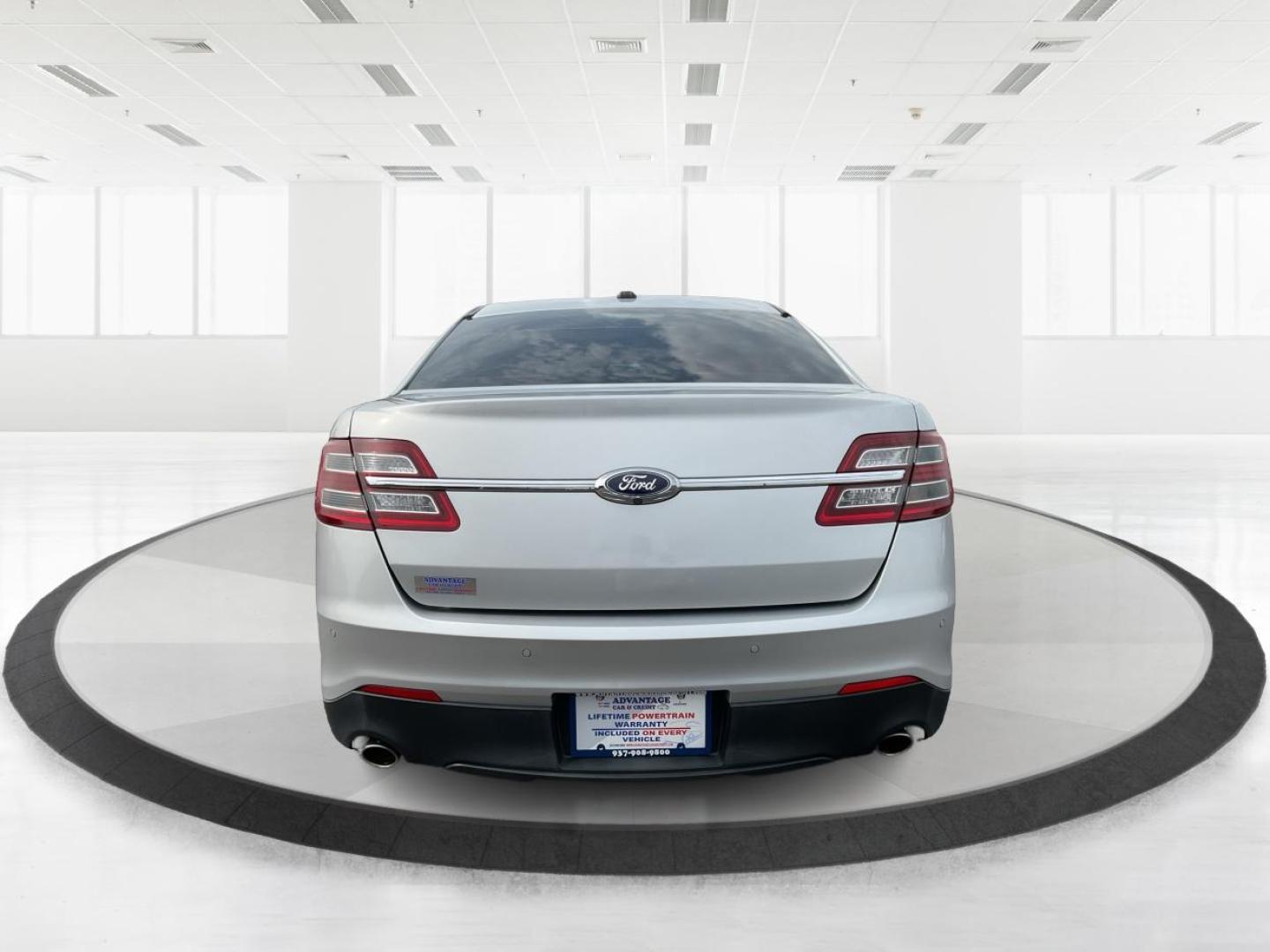 2014 Ford Taurus SEL (1FAHP2E86EG) with an EcoBoost 2L I-4 gasoline direct injection engine, located at 1099 N County Rd 25A, Troy, OH, 45373, (937) 908-9800, 40.057079, -84.212883 - Photo#4
