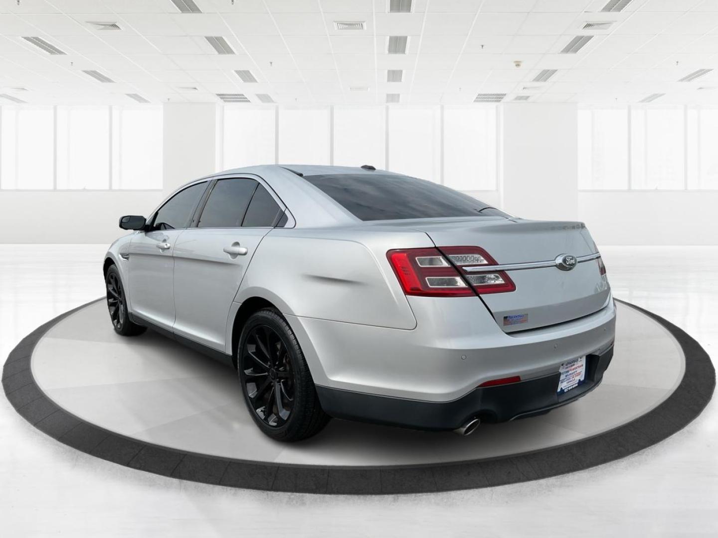 2014 Ford Taurus SEL (1FAHP2E86EG) with an EcoBoost 2L I-4 gasoline direct injection engine, located at 1099 N County Rd 25A, Troy, OH, 45373, (937) 908-9800, 40.057079, -84.212883 - Photo#5
