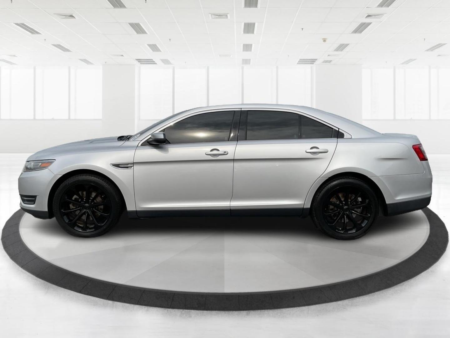 2014 Ford Taurus SEL (1FAHP2E86EG) with an EcoBoost 2L I-4 gasoline direct injection engine, located at 1099 N County Rd 25A, Troy, OH, 45373, (937) 908-9800, 40.057079, -84.212883 - Photo#6
