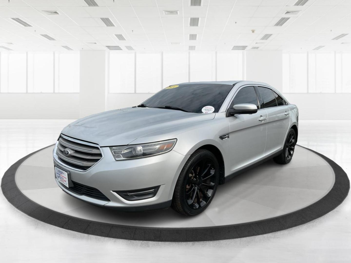 2014 Ford Taurus SEL (1FAHP2E86EG) with an EcoBoost 2L I-4 gasoline direct injection engine, located at 1099 N County Rd 25A, Troy, OH, 45373, (937) 908-9800, 40.057079, -84.212883 - Photo#8