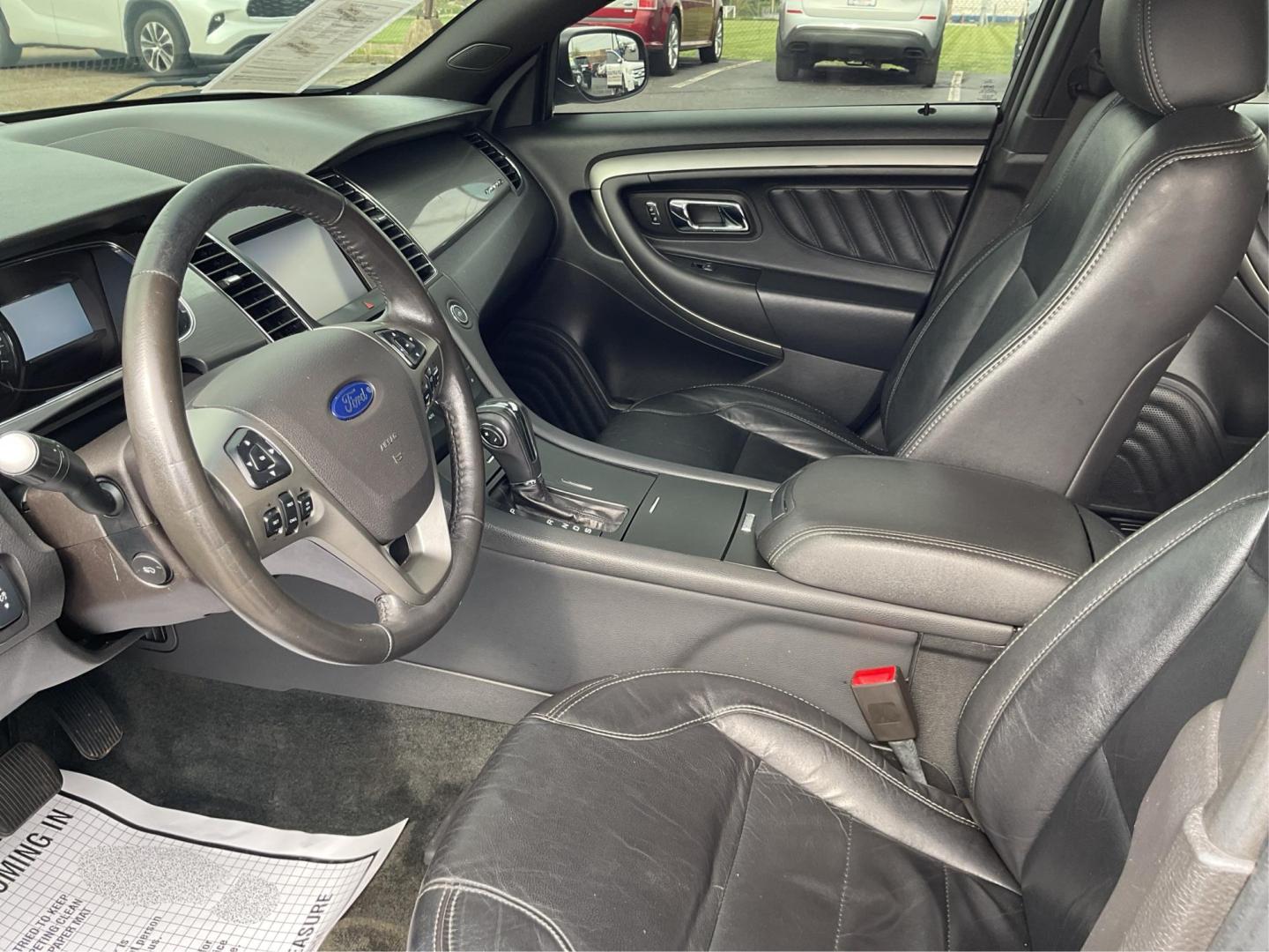 2014 Ford Taurus SEL (1FAHP2E86EG) with an EcoBoost 2L I-4 gasoline direct injection engine, located at 1099 N County Rd 25A, Troy, OH, 45373, (937) 908-9800, 40.057079, -84.212883 - Photo#9