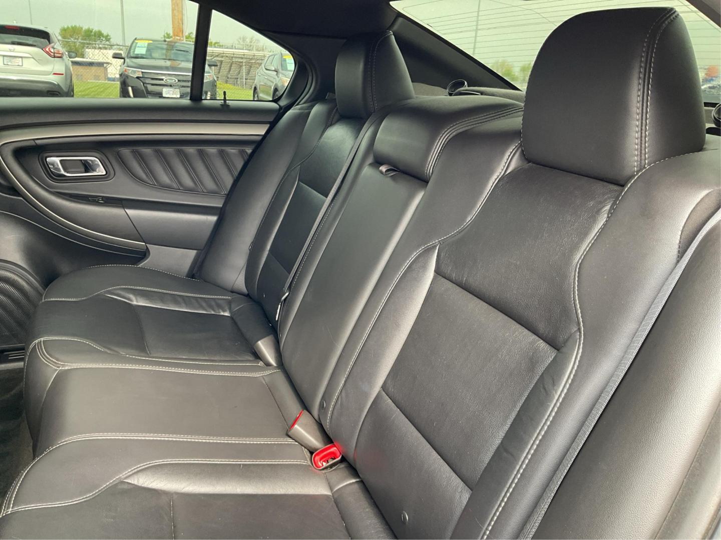 2014 Ford Taurus SEL (1FAHP2E86EG) with an EcoBoost 2L I-4 gasoline direct injection engine, located at 1099 N County Rd 25A, Troy, OH, 45373, (937) 908-9800, 40.057079, -84.212883 - Photo#10