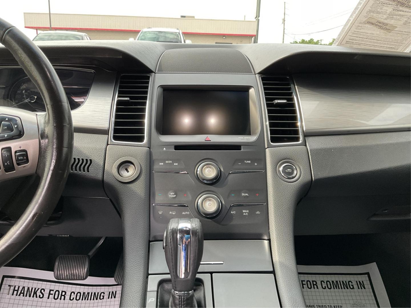 2014 Ford Taurus SEL (1FAHP2E86EG) with an EcoBoost 2L I-4 gasoline direct injection engine, located at 1099 N County Rd 25A, Troy, OH, 45373, (937) 908-9800, 40.057079, -84.212883 - Photo#13