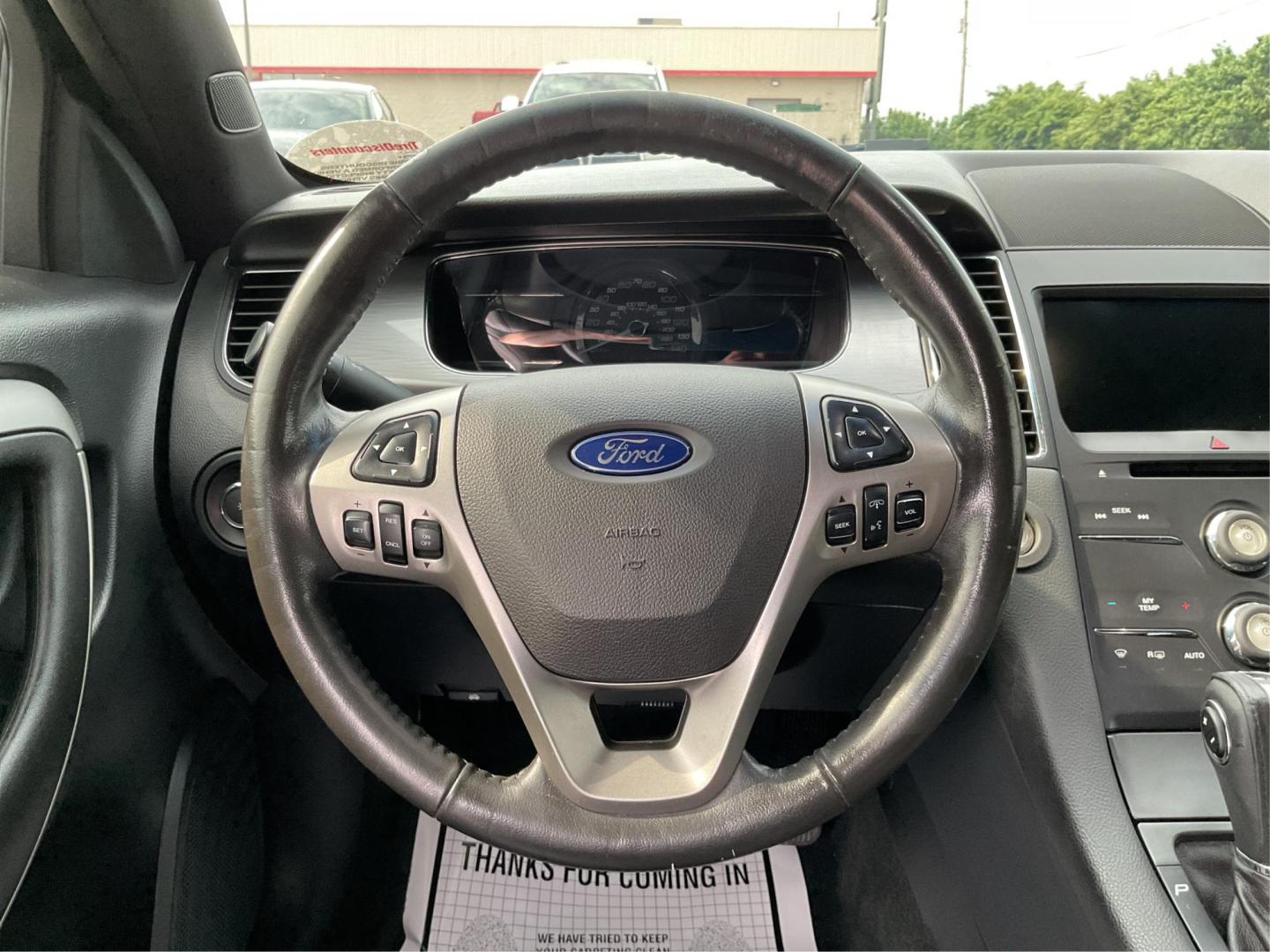 2014 Ford Taurus SEL (1FAHP2E86EG) with an EcoBoost 2L I-4 gasoline direct injection engine, located at 1099 N County Rd 25A, Troy, OH, 45373, (937) 908-9800, 40.057079, -84.212883 - Photo#16