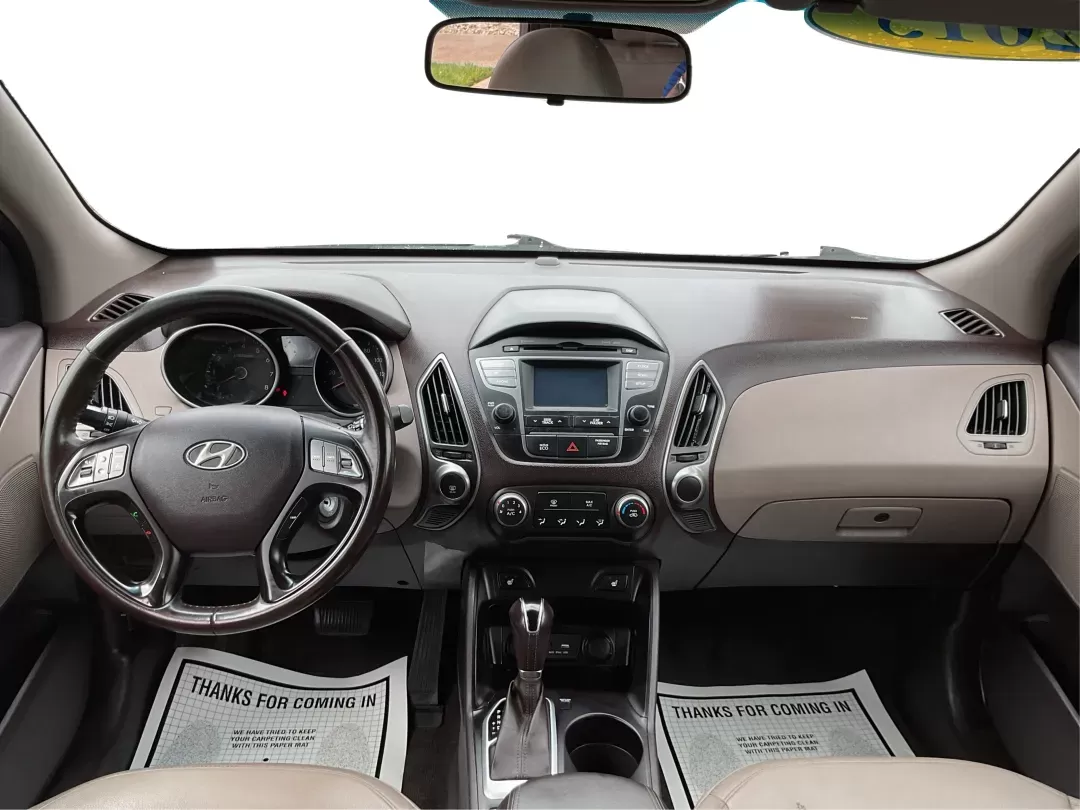 2015 Hyundai Tucson SE (KM8JUCAG2FU) with an Theta II 2.4L I-4 gasoline direct injection engine, located at 880 E. National Road, Vandalia, OH, 45377, (937) 908-9800, 39.891918, -84.183594 - 2015 Hyundai Tucson SE - Photo#19