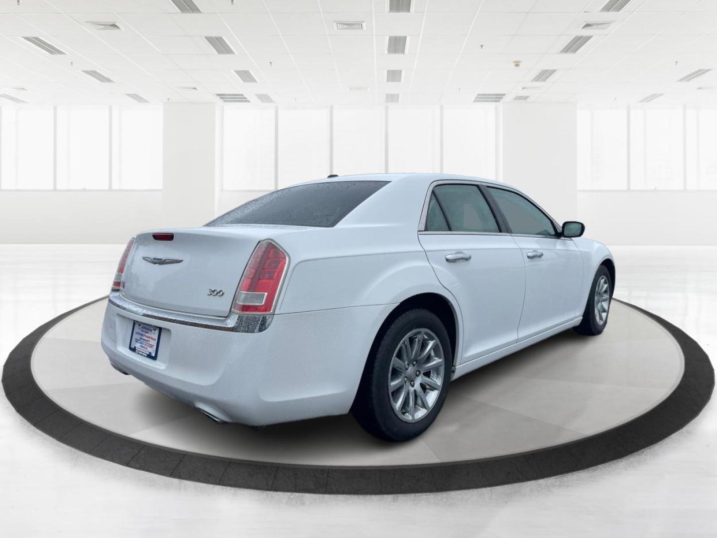 2012 Chrysler 300 Limited (2C3CCACG7CH) with an 3.6L V-6 DOHC engine, located at 8750 N County Rd 25A, Piqua, OH, 45356, (937) 908-9800, 40.164391, -84.232513 - Photo#2
