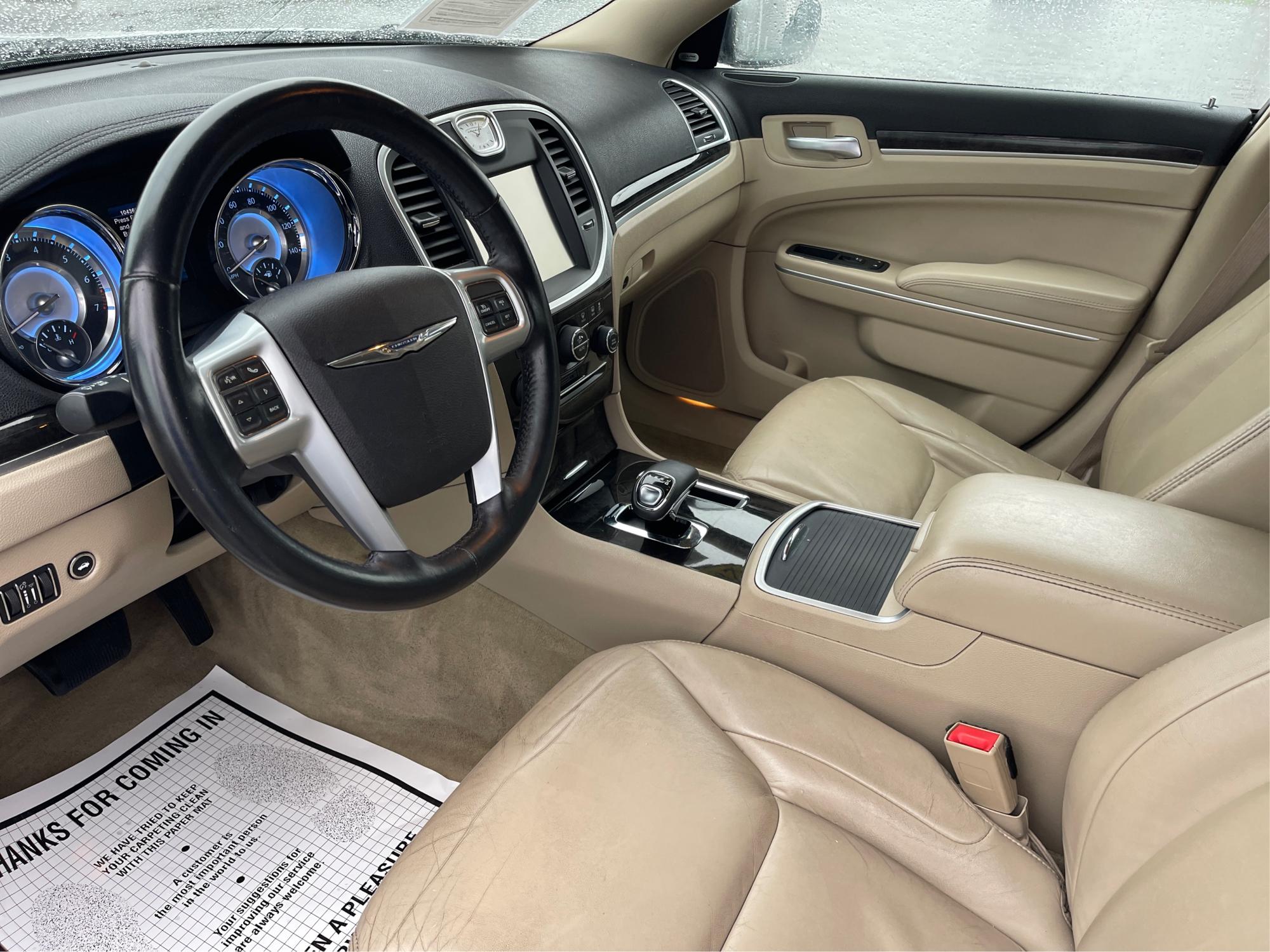 2012 Chrysler 300 Limited (2C3CCACG7CH) with an 3.6L V-6 DOHC engine, located at 8750 N County Rd 25A, Piqua, OH, 45356, (937) 908-9800, 40.164391, -84.232513 - 2012 Chrysler 300 Limited - Photo#9