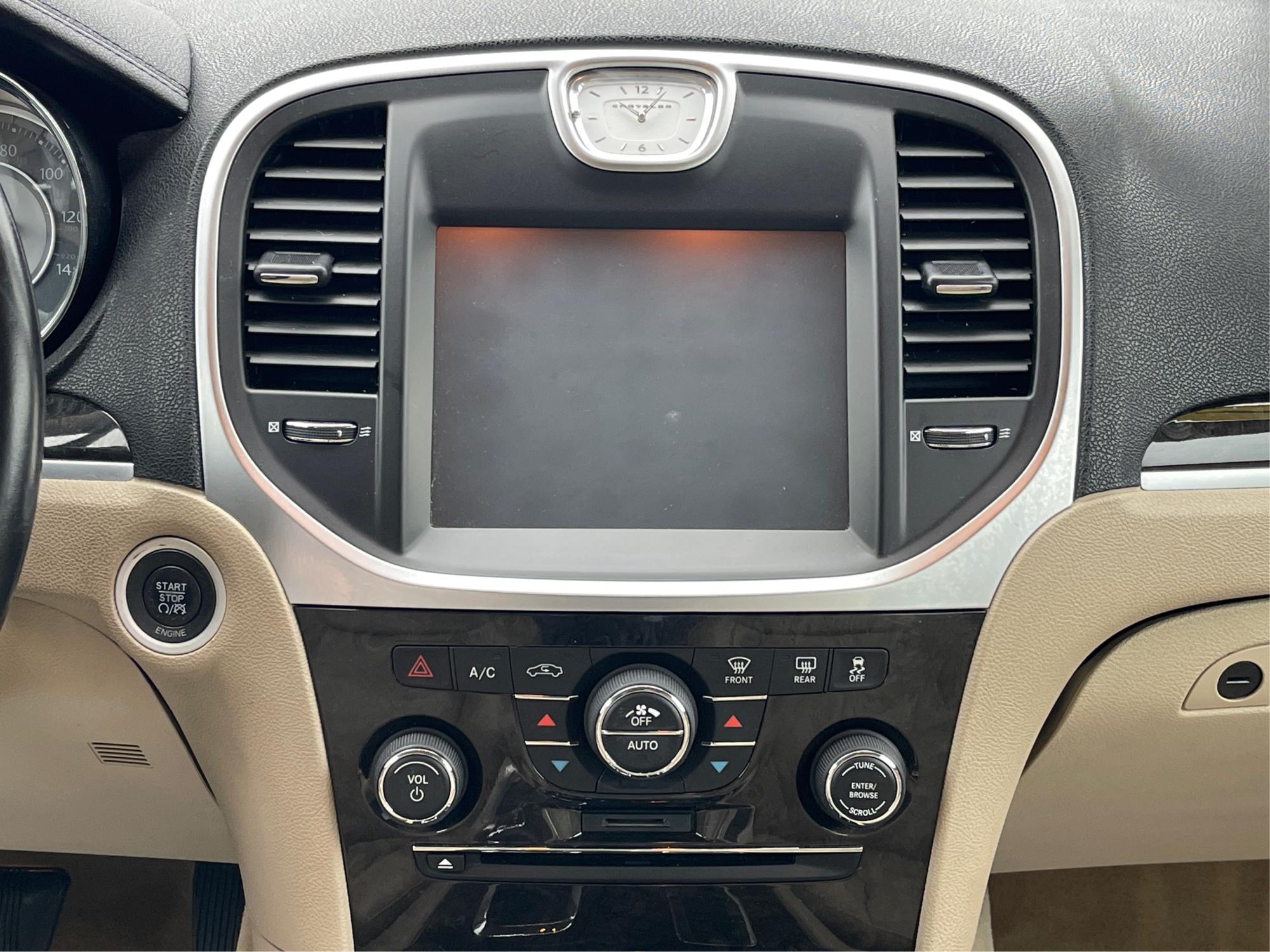 2012 Chrysler 300 Limited (2C3CCACG7CH) with an 3.6L V-6 DOHC engine, located at 8750 N County Rd 25A, Piqua, OH, 45356, (937) 908-9800, 40.164391, -84.232513 - 2012 Chrysler 300 Limited - Photo#13