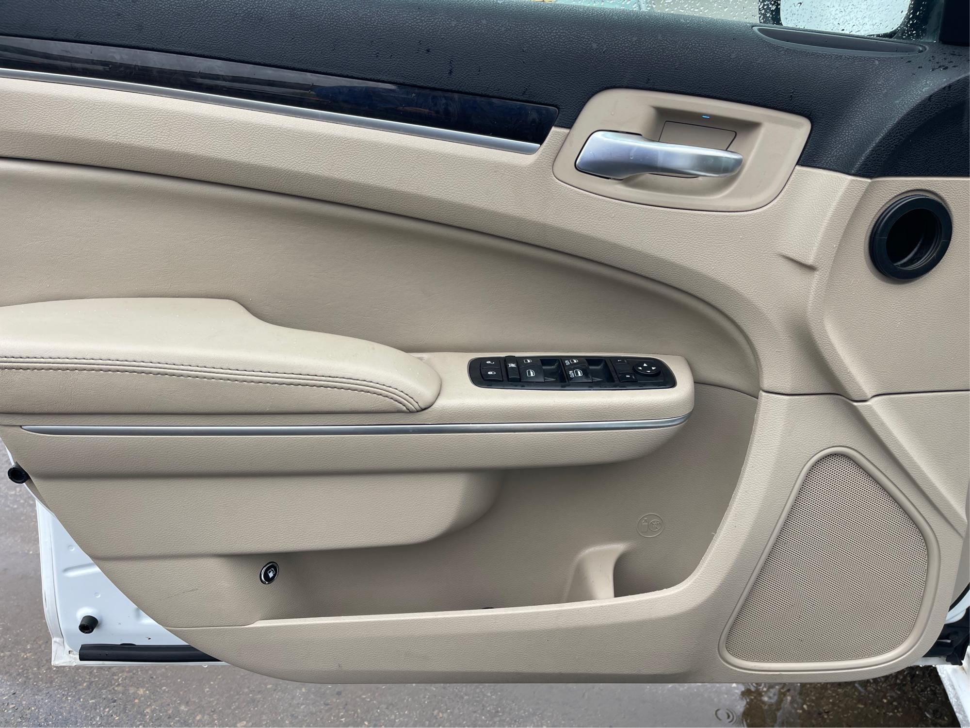 2012 Chrysler 300 Limited (2C3CCACG7CH) with an 3.6L V-6 DOHC engine, located at 8750 N County Rd 25A, Piqua, OH, 45356, (937) 908-9800, 40.164391, -84.232513 - 2012 Chrysler 300 Limited - Photo#17