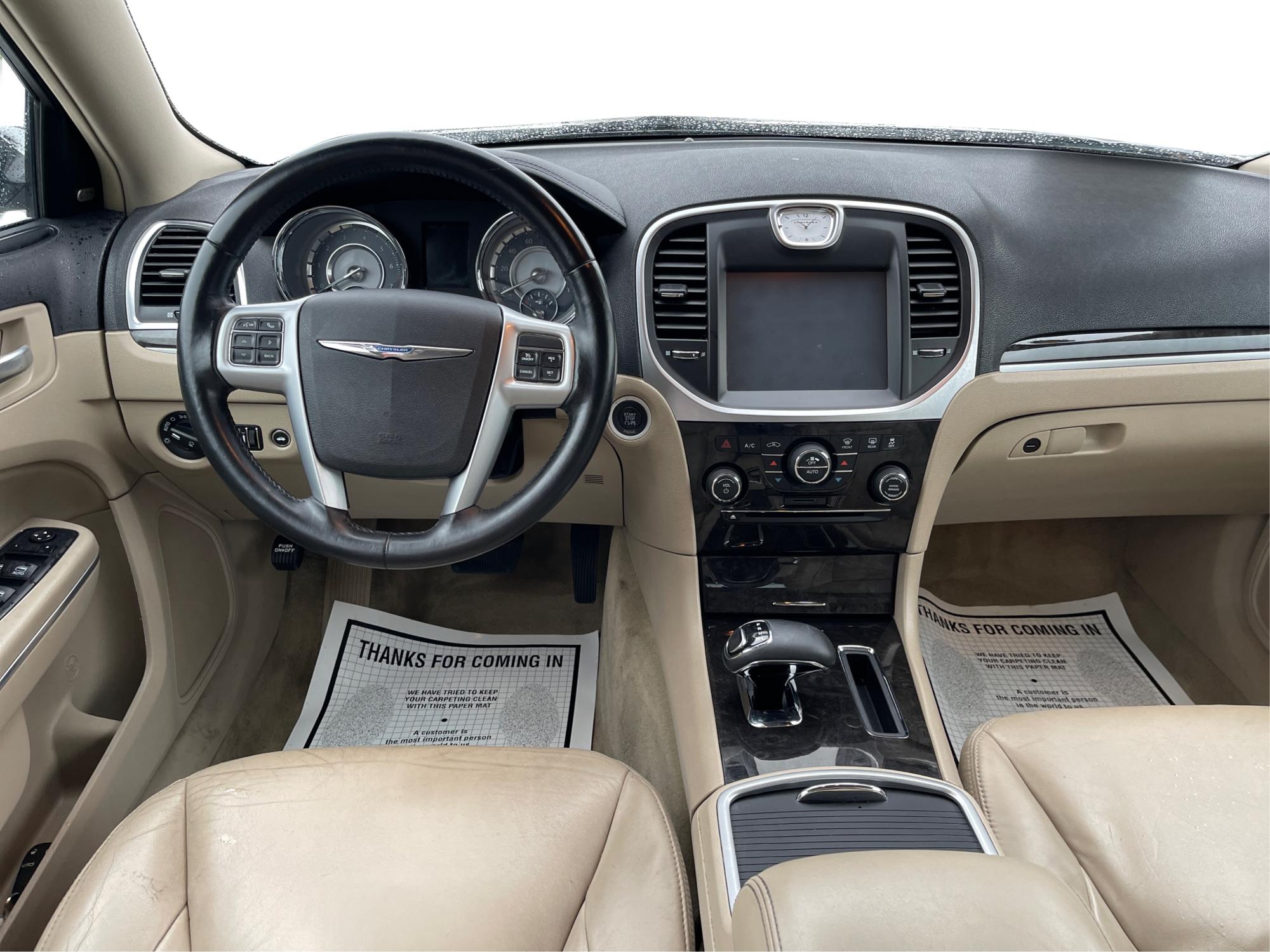 2012 Chrysler 300 Limited (2C3CCACG7CH) with an 3.6L V-6 DOHC engine, located at 8750 N County Rd 25A, Piqua, OH, 45356, (937) 908-9800, 40.164391, -84.232513 - 2012 Chrysler 300 Limited - Photo#19