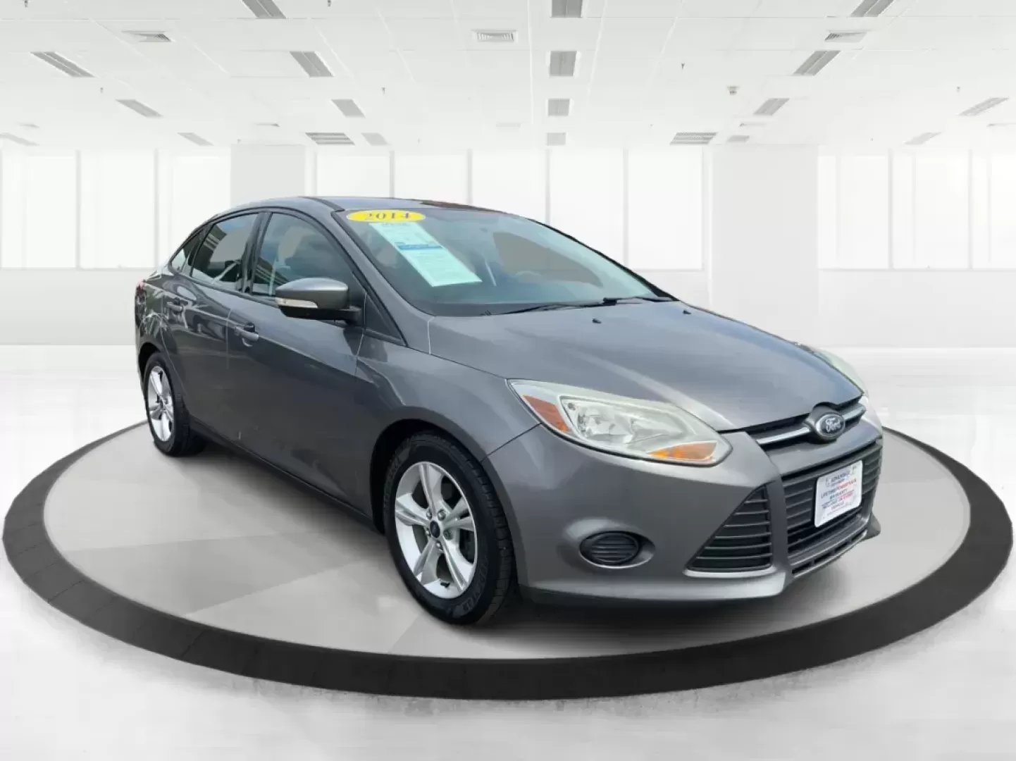 2014 Ford Focus SE (1FADP3F21EL) with an 2L I-4 gasoline direct injection engine, located at 1099 N County Rd 25A, Troy, OH, 45373, (937) 908-9800, 40.057079, -84.212883 - 2014 Ford Focus SE - Photo#0