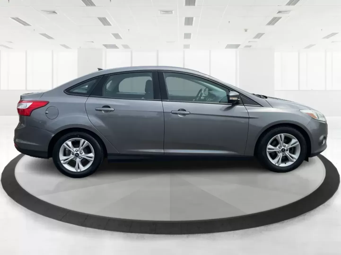 2014 Ford Focus SE (1FADP3F21EL) with an 2L I-4 gasoline direct injection engine, located at 1099 N County Rd 25A, Troy, OH, 45373, (937) 908-9800, 40.057079, -84.212883 - 2014 Ford Focus SE - Photo#1
