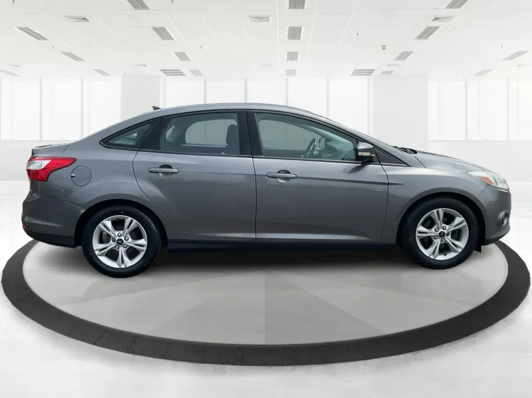 2014 Ford Focus SE (1FADP3F21EL) with an 2L I-4 gasoline direct injection engine, located at 1099 N County Rd 25A , Troy, OH, 45373, (937) 908-9800, 40.057079, -84.212883 - 2014 Ford Focus SE - Photo#1