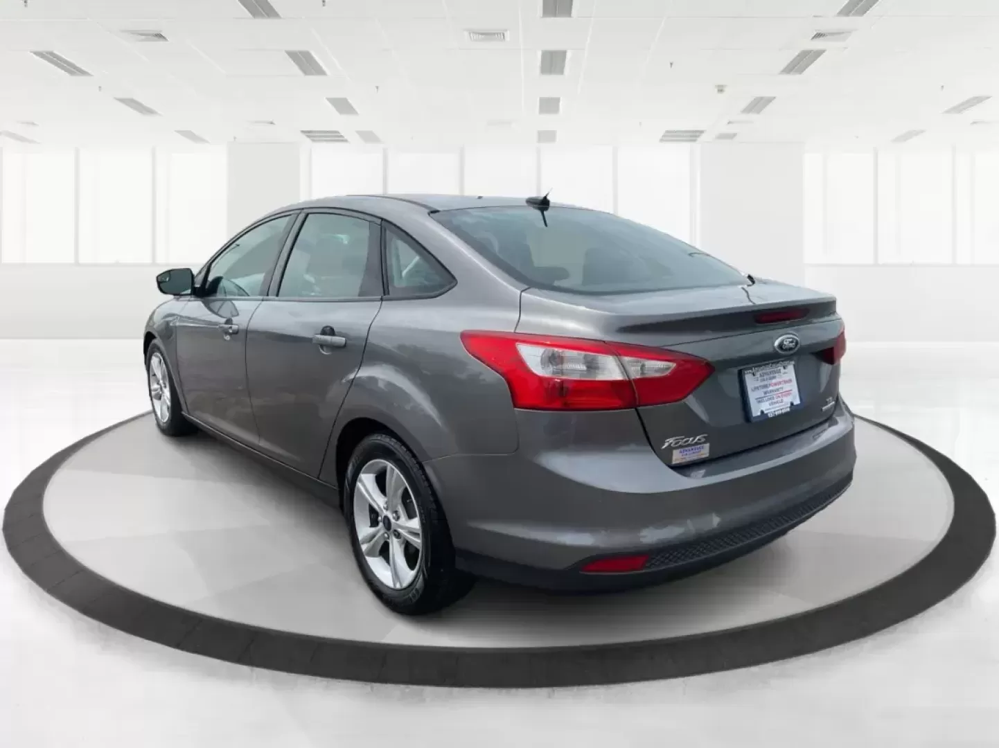 2014 Ford Focus SE (1FADP3F21EL) with an 2L I-4 gasoline direct injection engine, located at 1099 N County Rd 25A, Troy, OH, 45373, (937) 908-9800, 40.057079, -84.212883 - 2014 Ford Focus SE - Photo#4