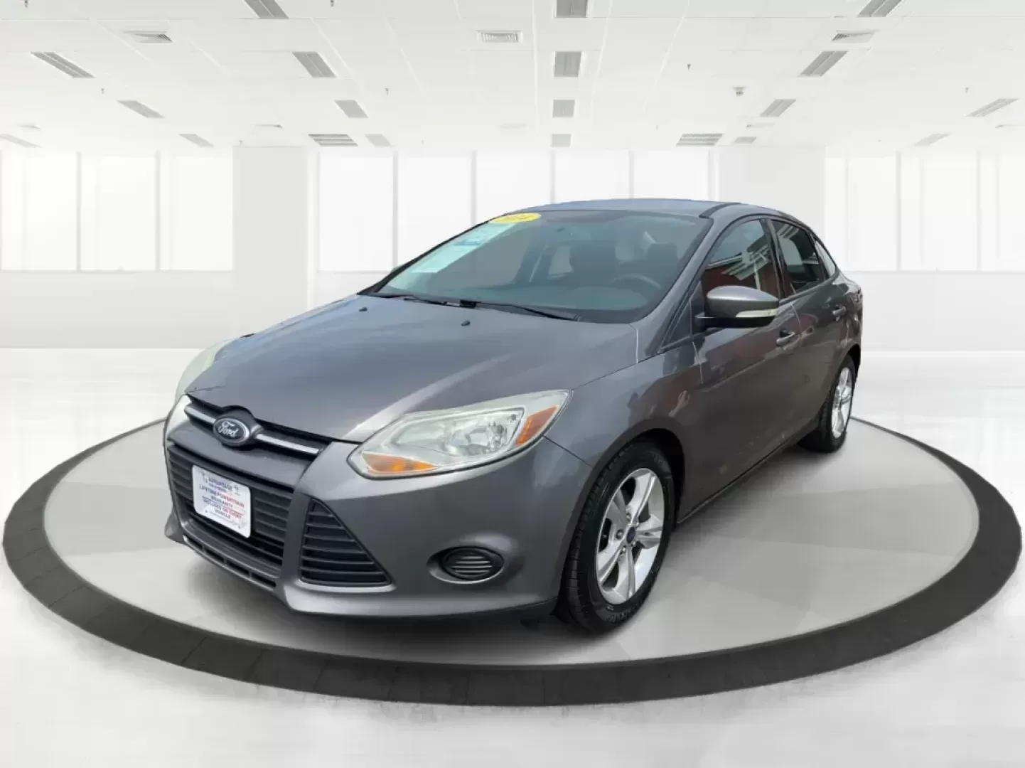 2014 Ford Focus SE (1FADP3F21EL) with an 2L I-4 gasoline direct injection engine, located at 1099 N County Rd 25A, Troy, OH, 45373, (937) 908-9800, 40.057079, -84.212883 - 2014 Ford Focus SE - Photo#7