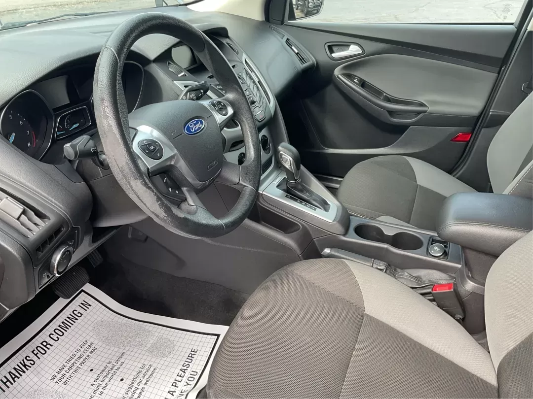 2014 Ford Focus SE (1FADP3F21EL) with an 2L I-4 gasoline direct injection engine, located at 1099 N County Rd 25A , Troy, OH, 45373, (937) 908-9800, 40.057079, -84.212883 - 2014 Ford Focus SE - Photo#8