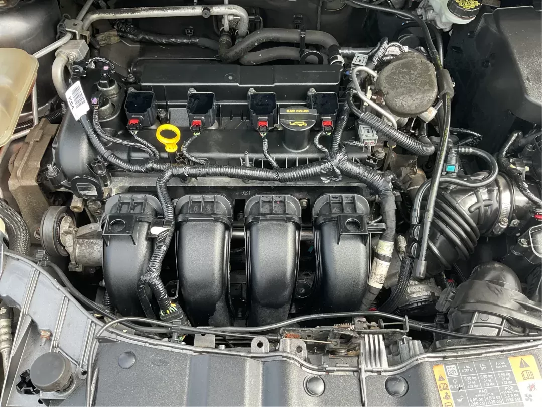 2014 Ford Focus SE (1FADP3F21EL) with an 2L I-4 gasoline direct injection engine, located at 1099 N County Rd 25A , Troy, OH, 45373, (937) 908-9800, 40.057079, -84.212883 - 2014 Ford Focus SE - Photo#10