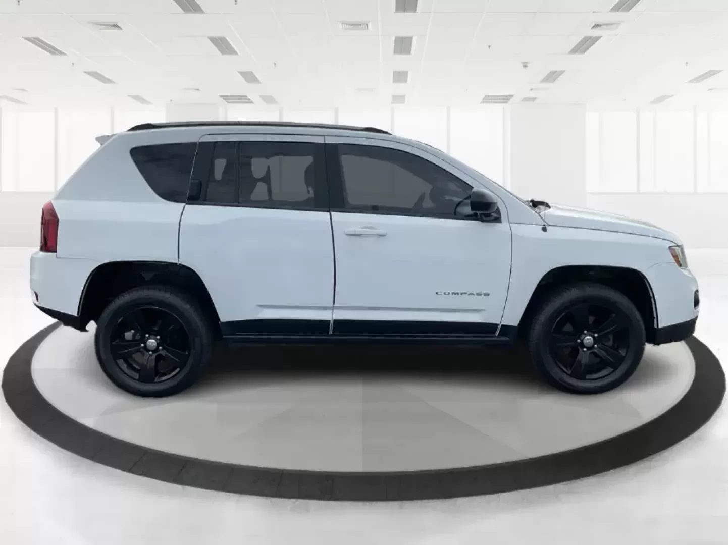 2015 Jeep Compass Sport (1C4NJDBB6FD) with an 2.4L I-4 DOHC engine, located at 1099 N County Rd 25A, Troy, OH, 45373, (937) 908-9800, 40.057079, -84.212883 - 2015 Jeep Compass Sport - Photo#1