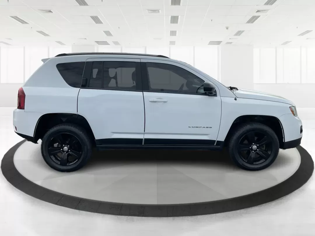 2015 Jeep Compass Sport (1C4NJDBB6FD) with an 2.4L I-4 DOHC engine, located at 1099 N County Rd 25A , Troy, OH, 45373, (937) 908-9800, 40.057079, -84.212883 - 2015 Jeep Compass Sport - Photo#1