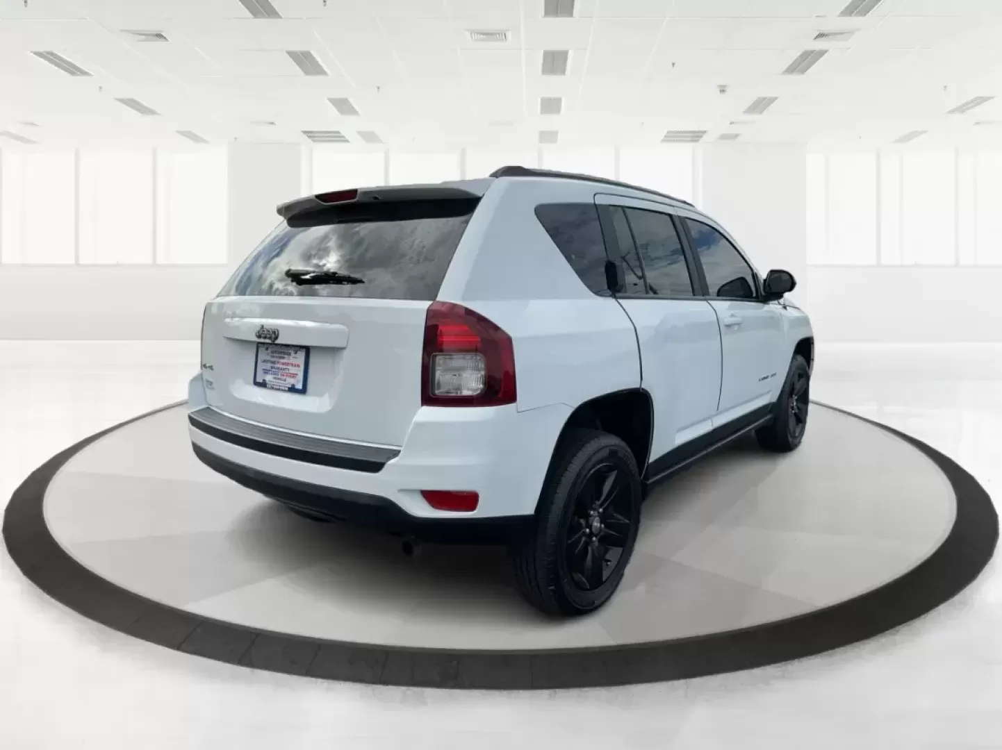 2015 Jeep Compass Sport (1C4NJDBB6FD) with an 2.4L I-4 DOHC engine, located at 1099 N County Rd 25A, Troy, OH, 45373, (937) 908-9800, 40.057079, -84.212883 - 2015 Jeep Compass Sport - Photo#2