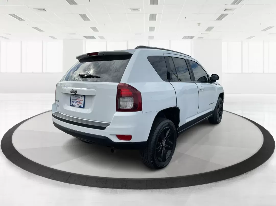 2015 Jeep Compass Sport (1C4NJDBB6FD) with an 2.4L I-4 DOHC engine, located at 1099 N County Rd 25A , Troy, OH, 45373, (937) 908-9800, 40.057079, -84.212883 - 2015 Jeep Compass Sport - Photo#2