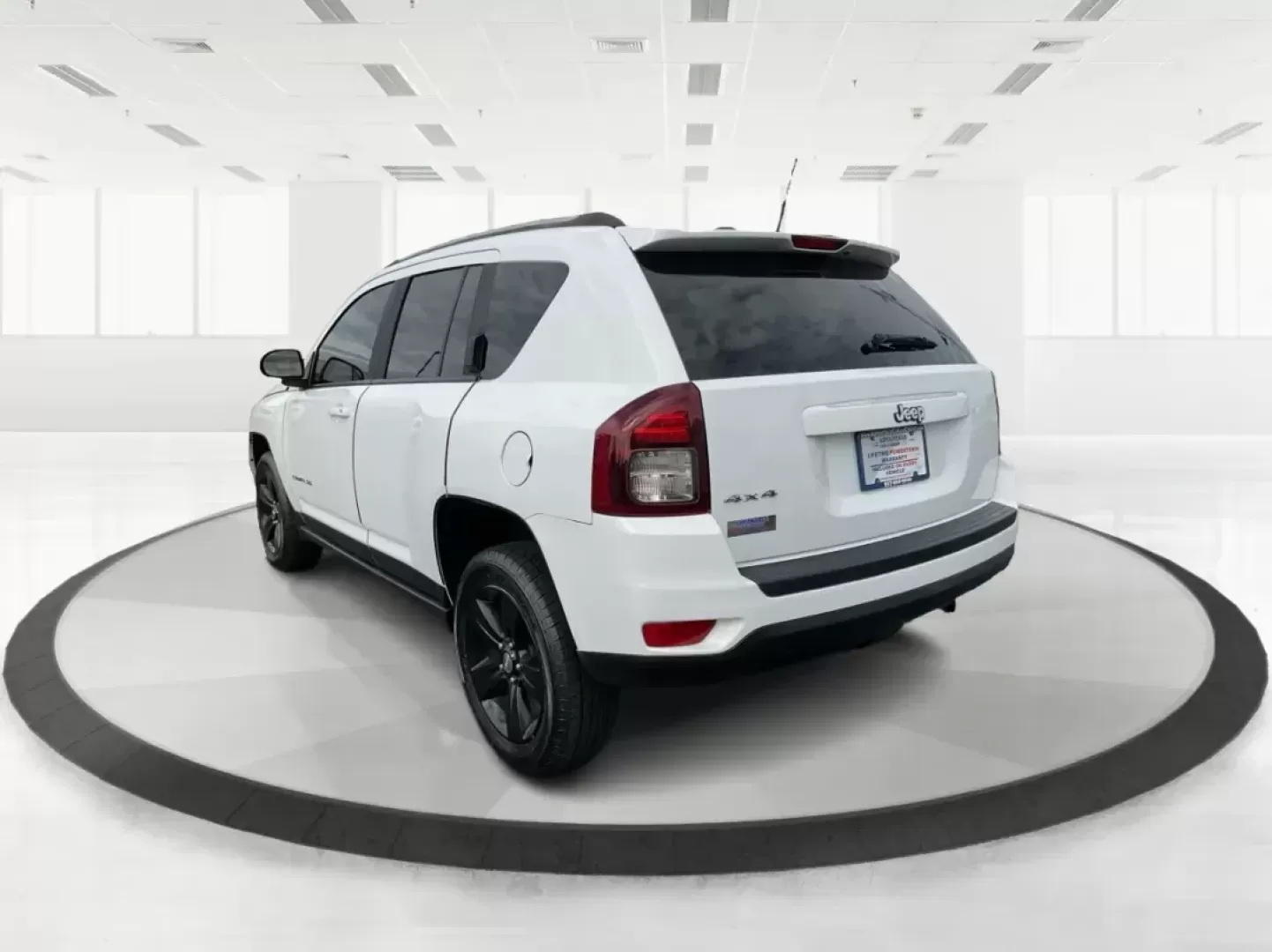 2015 Jeep Compass Sport (1C4NJDBB6FD) with an 2.4L I-4 DOHC engine, located at 1099 N County Rd 25A, Troy, OH, 45373, (937) 908-9800, 40.057079, -84.212883 - 2015 Jeep Compass Sport - Photo#4
