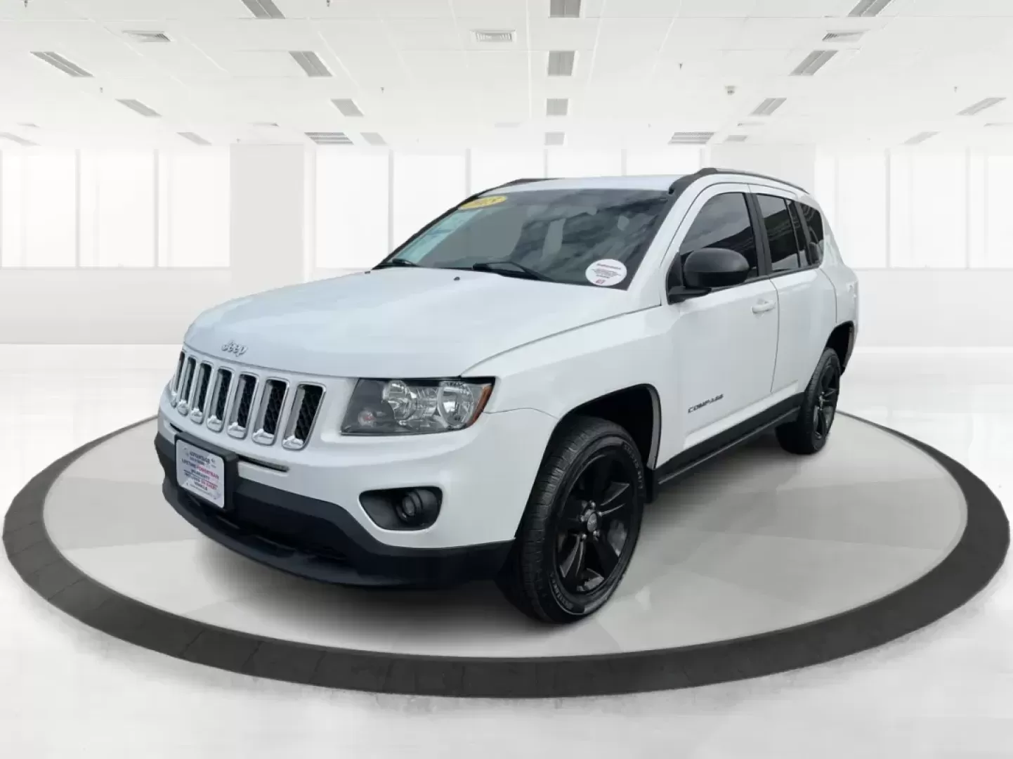 2015 Jeep Compass Sport (1C4NJDBB6FD) with an 2.4L I-4 DOHC engine, located at 1099 N County Rd 25A, Troy, OH, 45373, (937) 908-9800, 40.057079, -84.212883 - 2015 Jeep Compass Sport - Photo#7