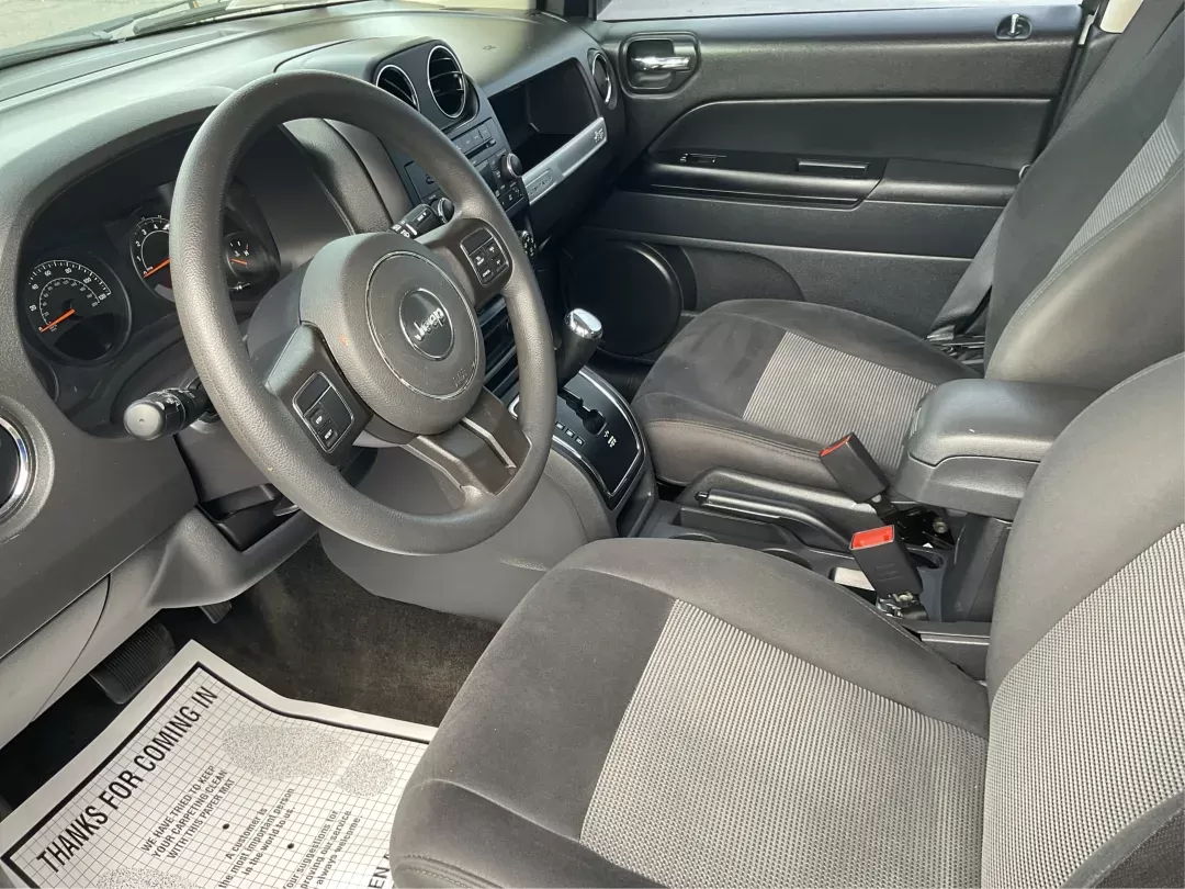 2015 Jeep Compass Sport (1C4NJDBB6FD) with an 2.4L I-4 DOHC engine, located at 1099 N County Rd 25A , Troy, OH, 45373, (937) 908-9800, 40.057079, -84.212883 - 2015 Jeep Compass Sport - Photo#8