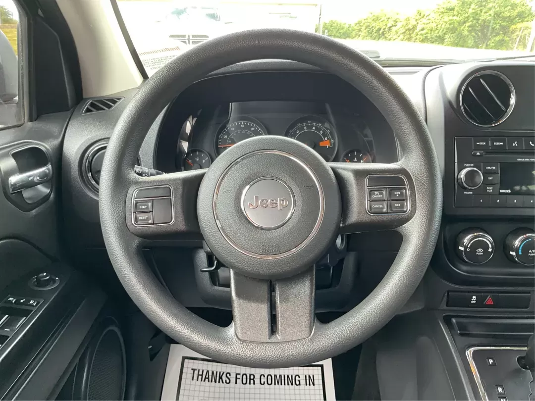 2015 Jeep Compass Sport (1C4NJDBB6FD) with an 2.4L I-4 DOHC engine, located at 1099 N County Rd 25A , Troy, OH, 45373, (937) 908-9800, 40.057079, -84.212883 - 2015 Jeep Compass Sport - Photo#15