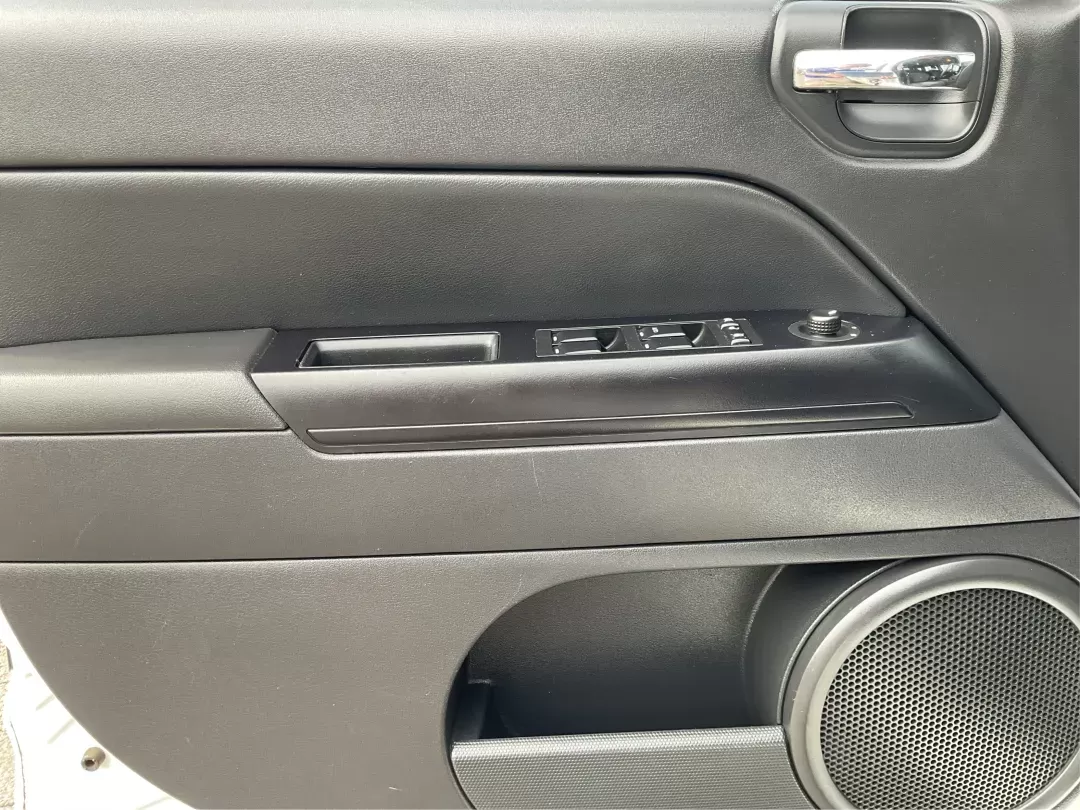 2015 Jeep Compass Sport (1C4NJDBB6FD) with an 2.4L I-4 DOHC engine, located at 1099 N County Rd 25A , Troy, OH, 45373, (937) 908-9800, 40.057079, -84.212883 - 2015 Jeep Compass Sport - Photo#16