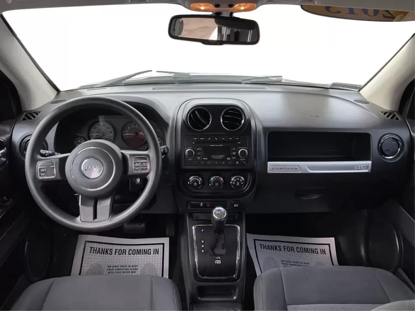 2015 Jeep Compass Sport (1C4NJDBB6FD) with an 2.4L I-4 DOHC engine, located at 1099 N County Rd 25A, Troy, OH, 45373, (937) 908-9800, 40.057079, -84.212883 - 2015 Jeep Compass Sport - Photo#18