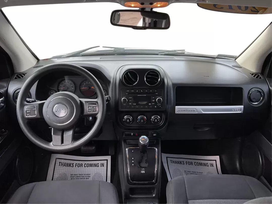 2015 Jeep Compass Sport (1C4NJDBB6FD) with an 2.4L I-4 DOHC engine, located at 1099 N County Rd 25A , Troy, OH, 45373, (937) 908-9800, 40.057079, -84.212883 - 2015 Jeep Compass Sport - Photo#18