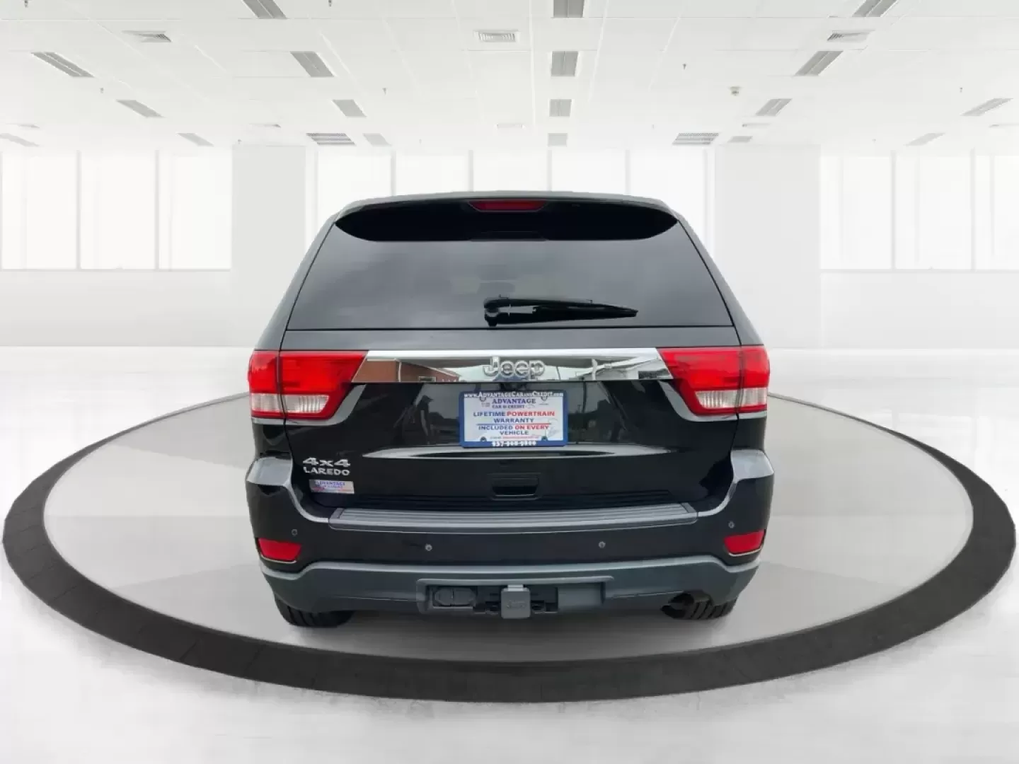 2013 Jeep Grand Cherokee Laredo (1C4RJFAGXDC) with an Other engine, located at 8750 N County Rd 25A, Piqua, OH, 45356, (937) 908-9800, 40.164391, -84.232513 - Photo#4