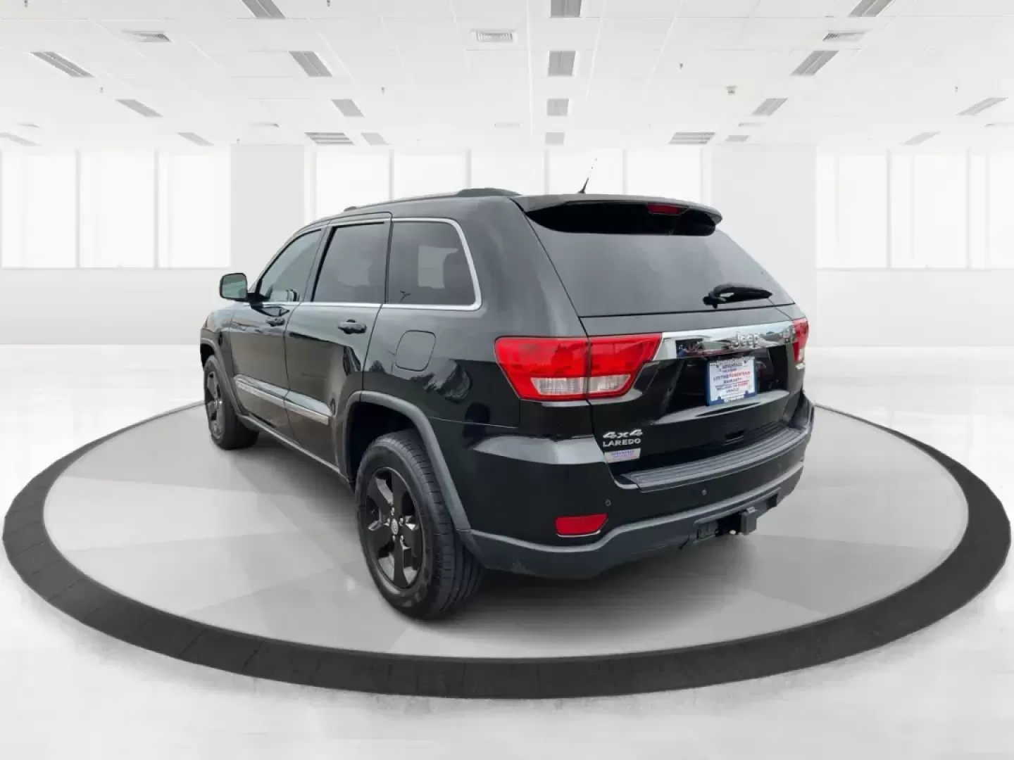 2013 Jeep Grand Cherokee Laredo (1C4RJFAGXDC) with an Other engine, located at 8750 N County Rd 25A, Piqua, OH, 45356, (937) 908-9800, 40.164391, -84.232513 - Photo#5